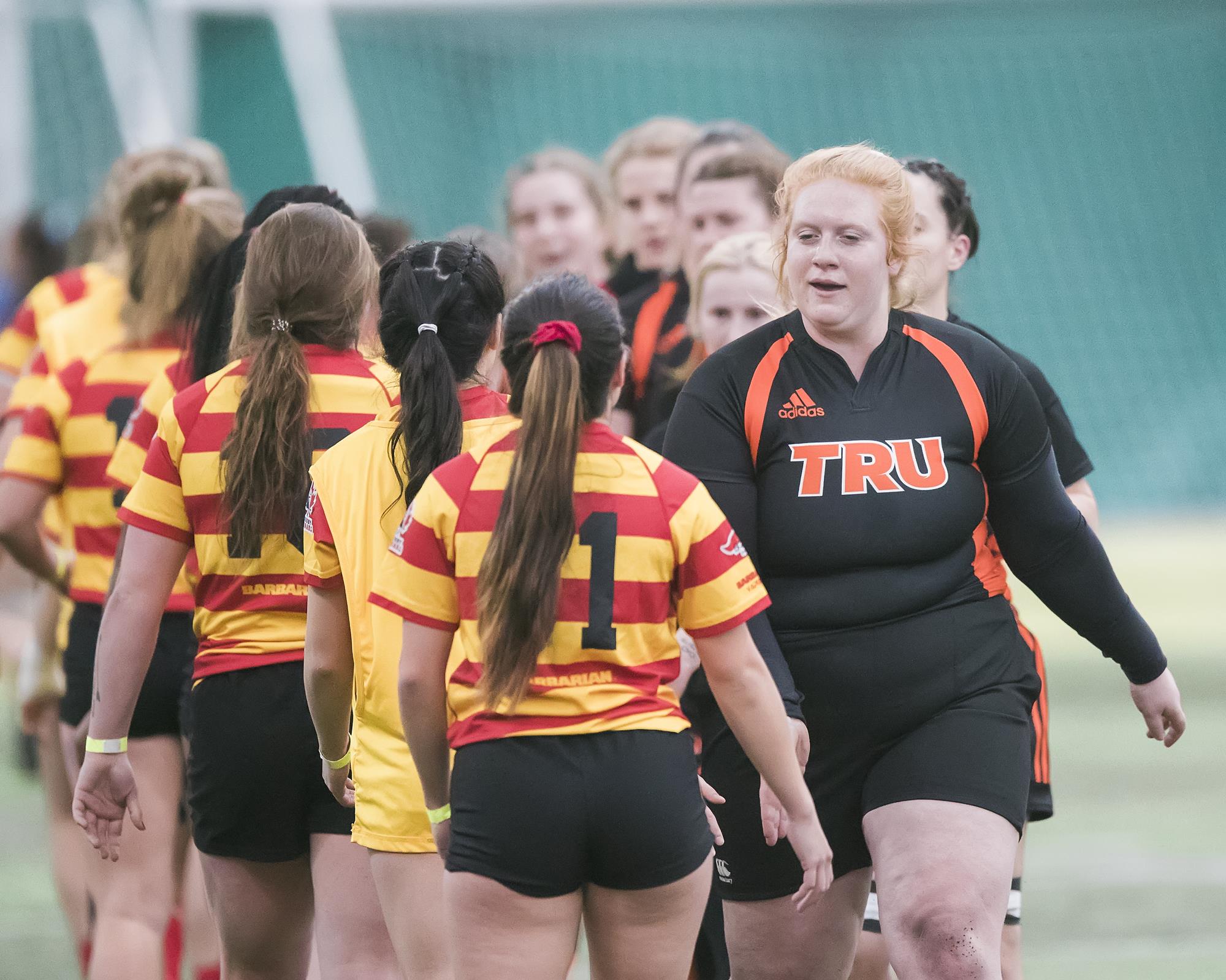 shanking hands after playing Calgary