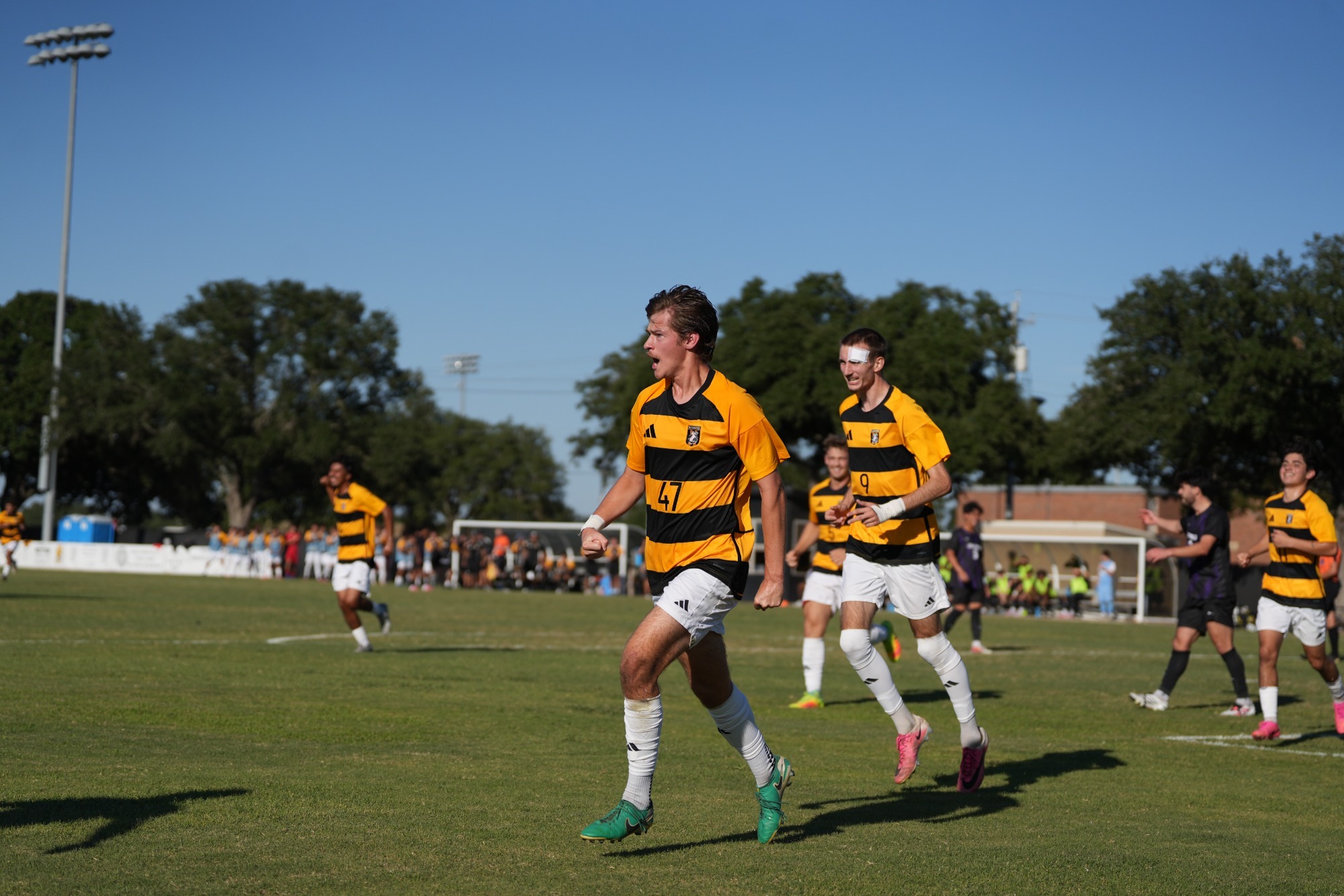 Nicholas Dunn celebrates