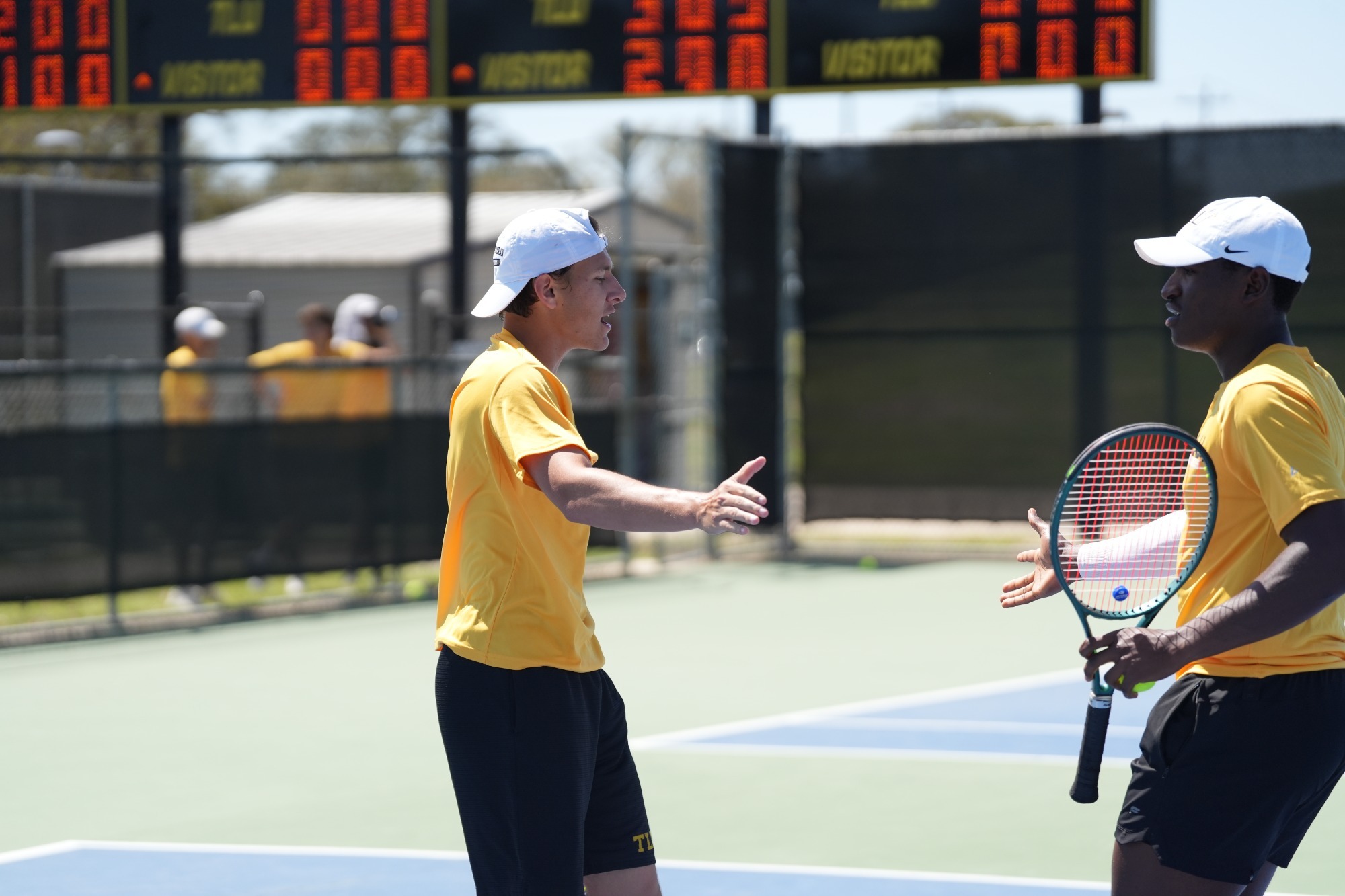 Kadon Sullins and Ajonte St. Ville celebrate