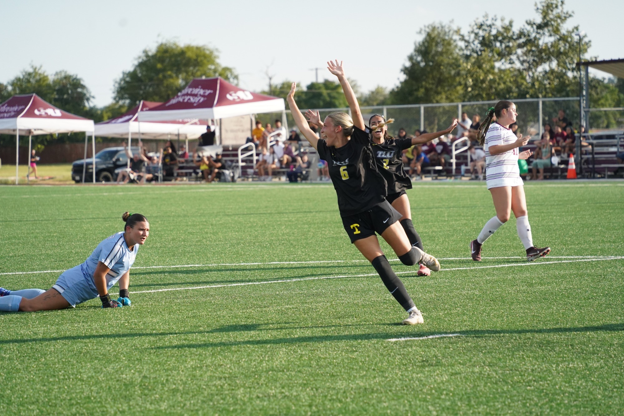 Makenzie Ivie celebrates after her goal