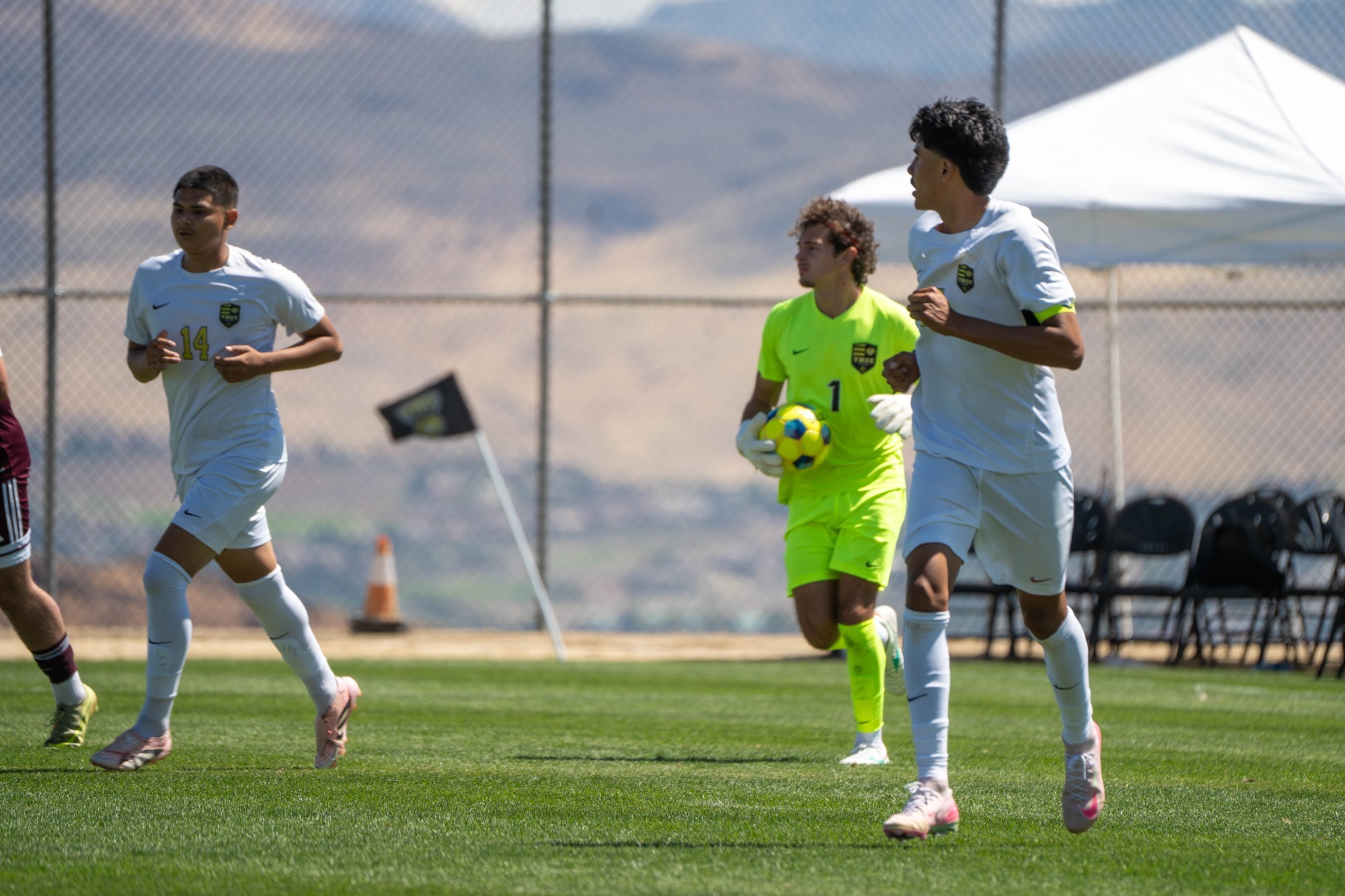 Edwin Ugalde (right), Sawyer Morris (1) and Omar Estrada (14) get set as they prepare for a goalie punt.