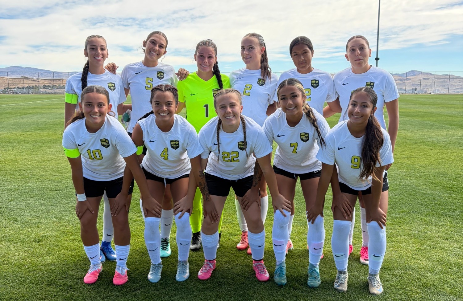 TMCC Women's soccer starting eleven team lined up to take a pregame picture