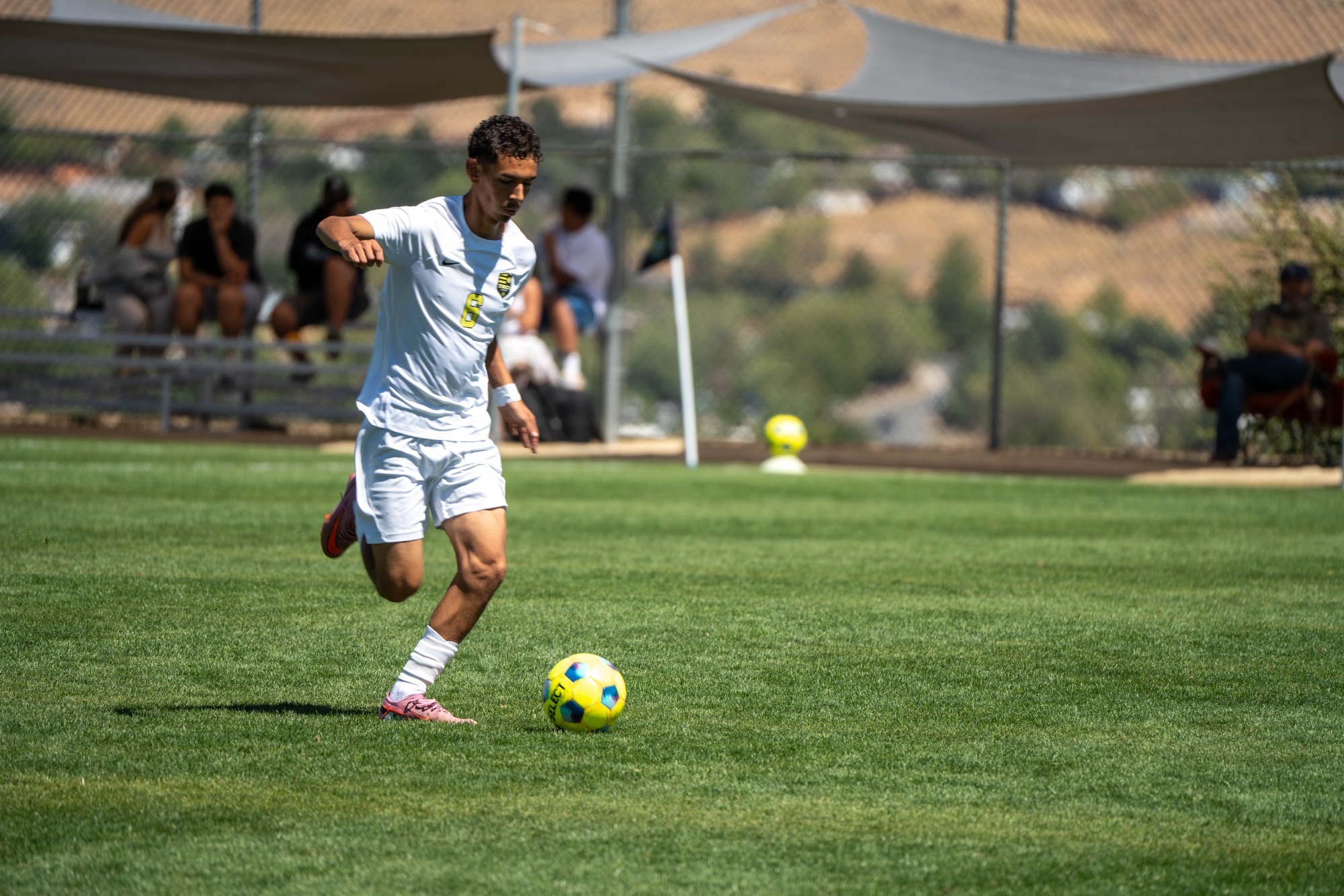 TMCC’s Brayan Caldera (#6) moves the ball down the field during a soccer match at the TMCC Soccer Field.