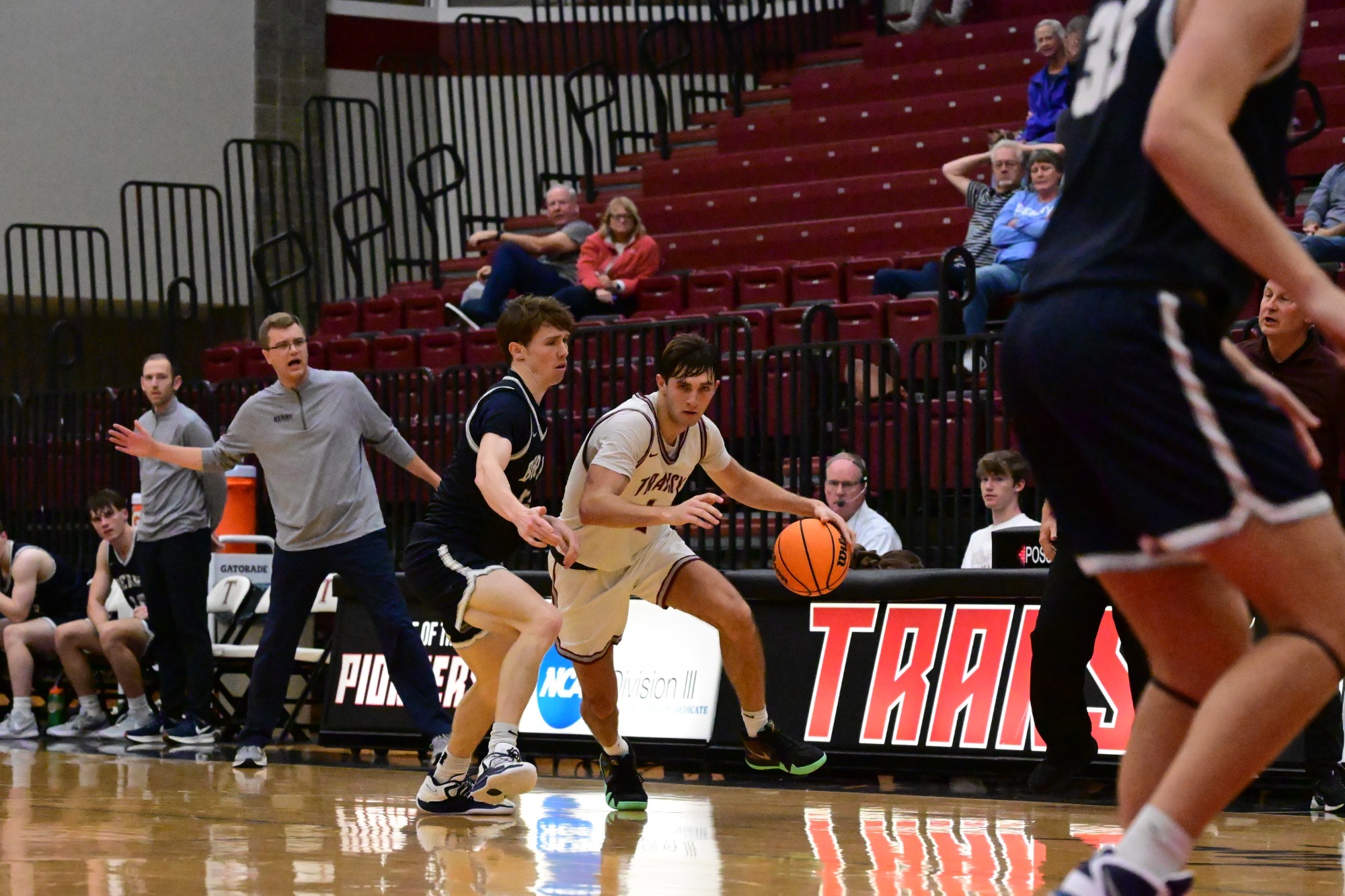 Drew Marshall (#1) drives to the basket in the victory over Berry. 