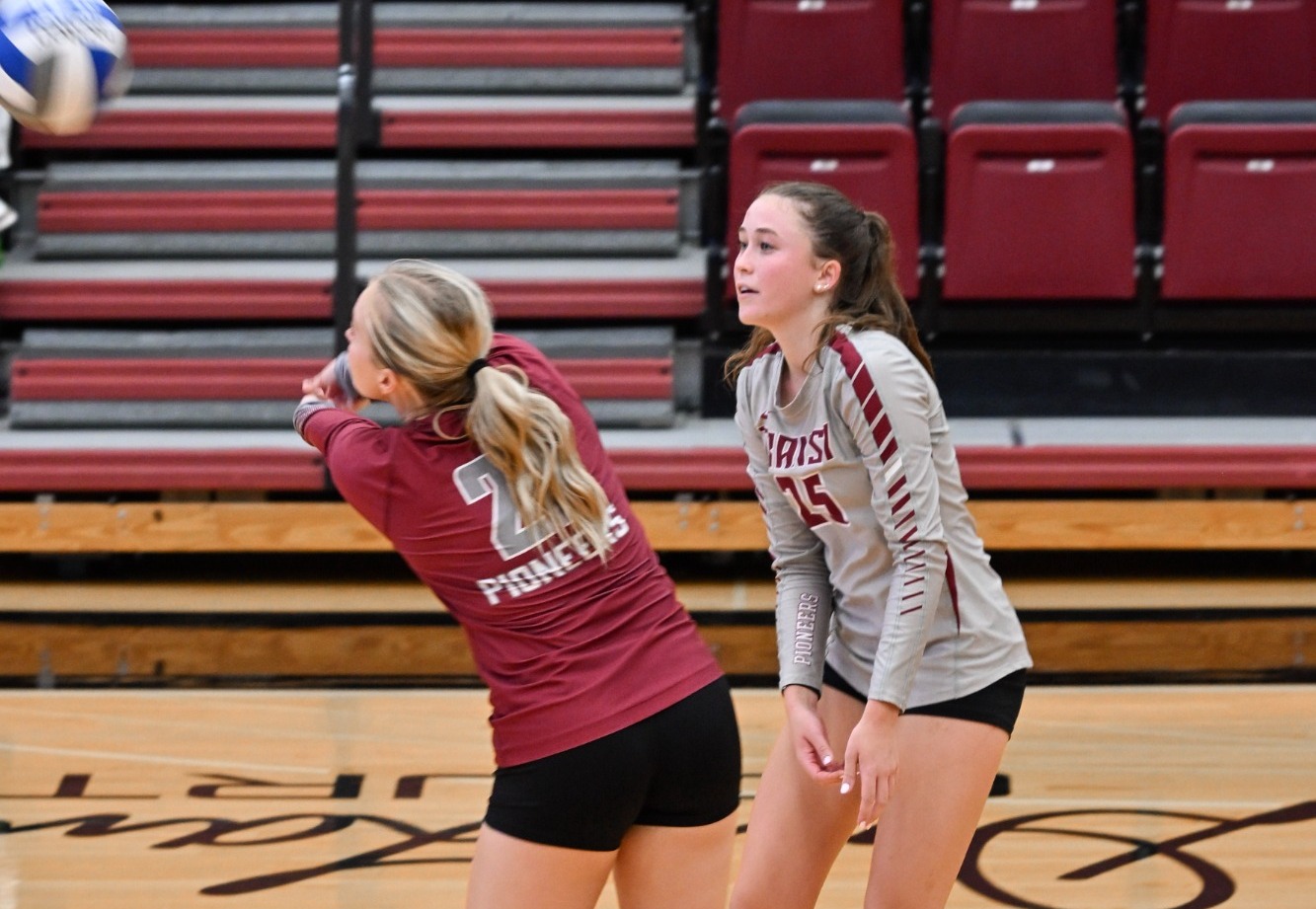 Megan Helander (#25) digs against Otterbein at the Clive M. Beck Center. 