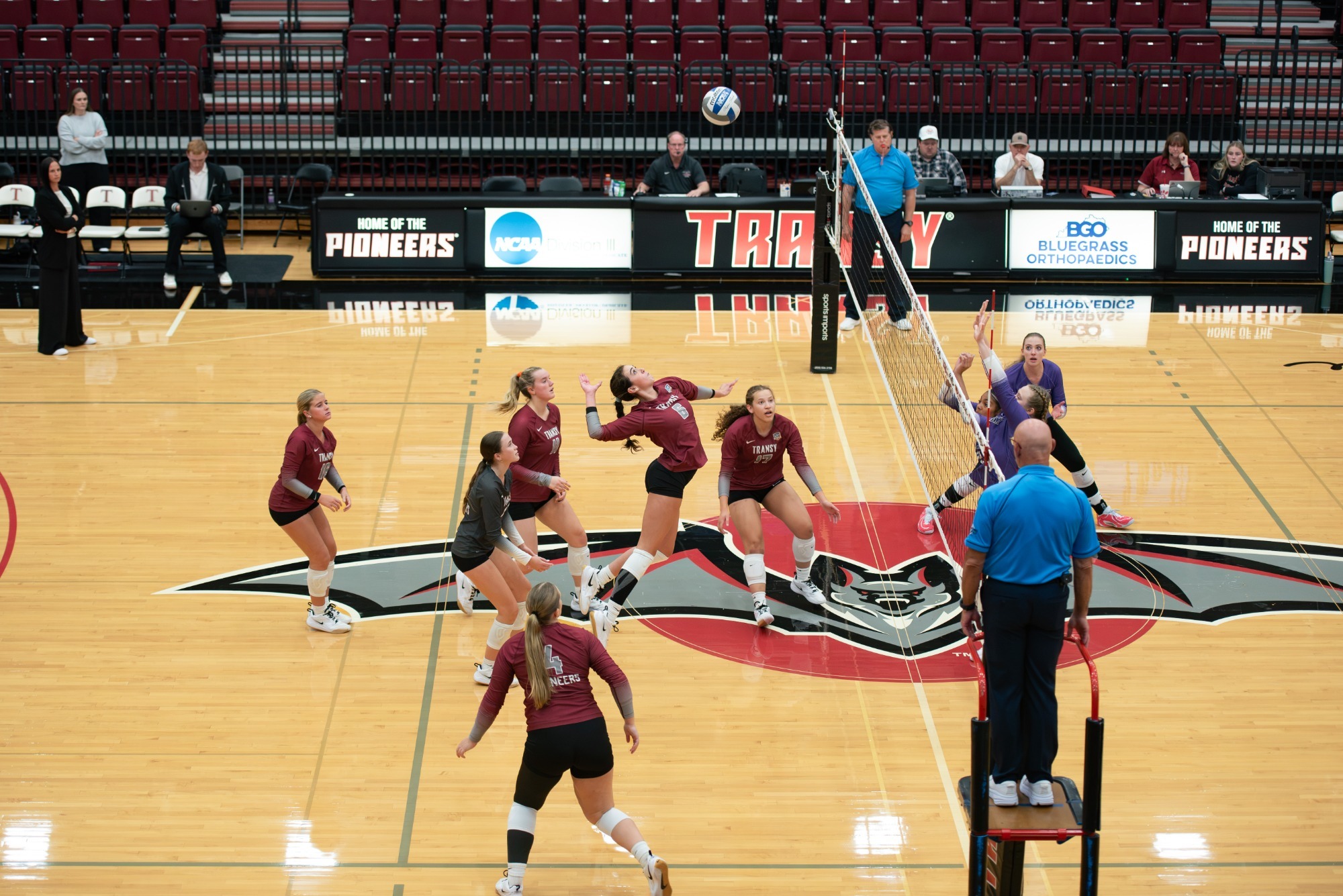 Payton Avilez (#6) goes for the attack in Transylvania