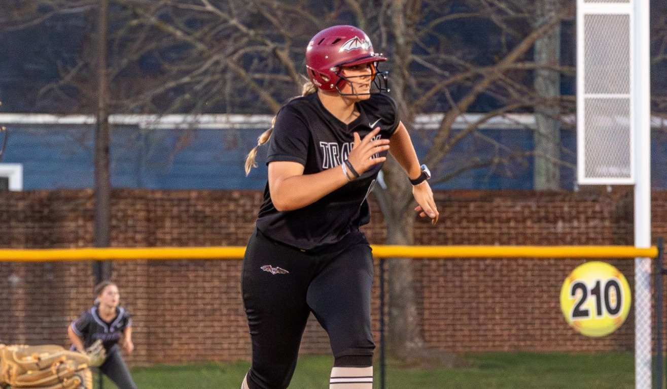 Emilie Young steals third base in Transylvania's Match Up at John and Donna Hall Field