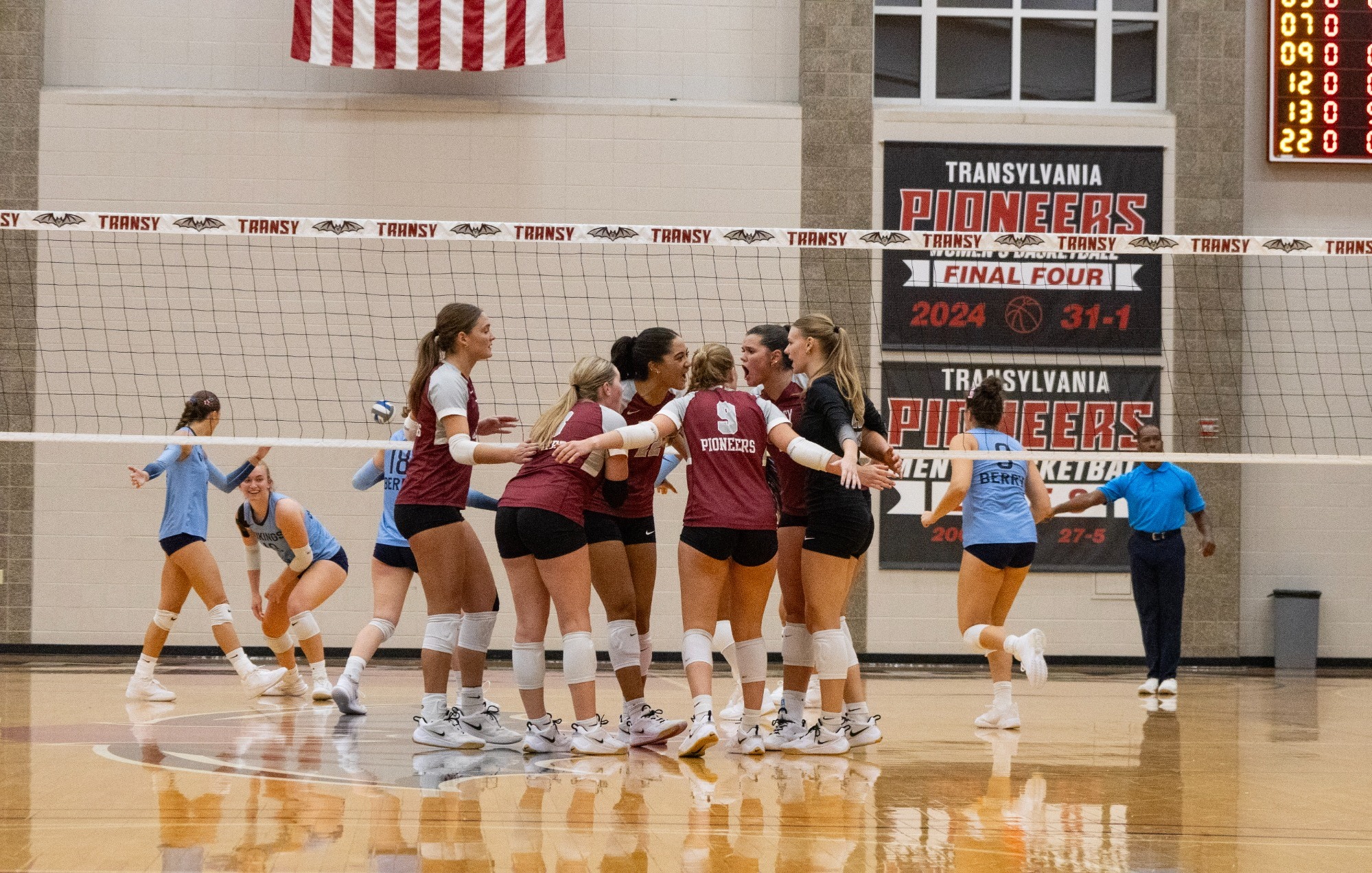 Women's Volleyball huddles during their home opener against #5 Berry at the Clive M. Beck Center. 
