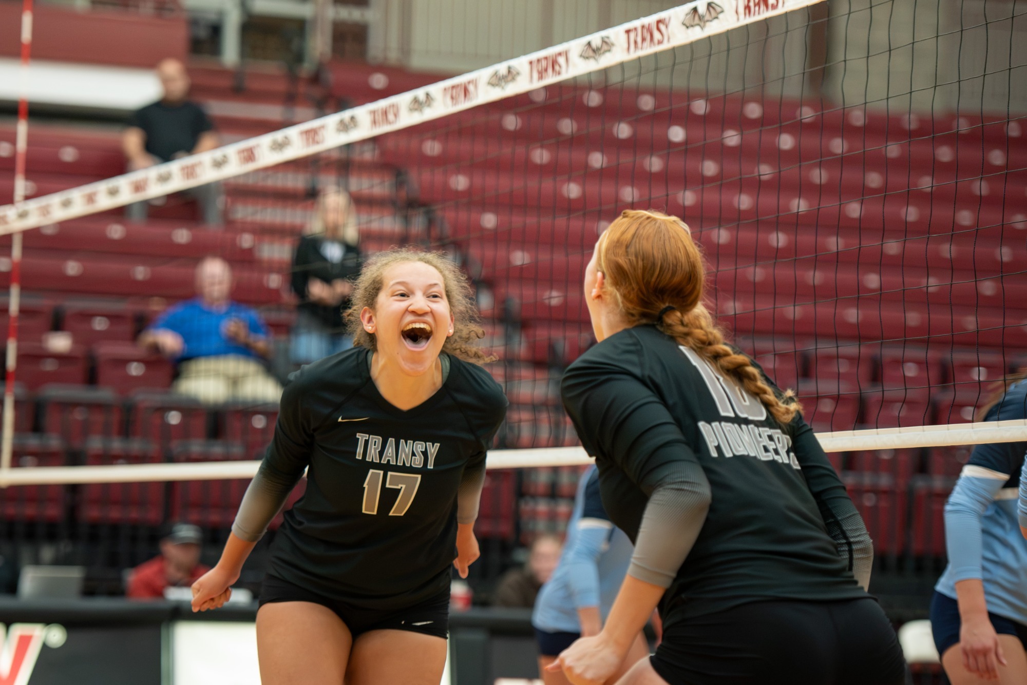 Logan Dunham celebrates a kill in Transylvania's five set thriller against Marietta. 