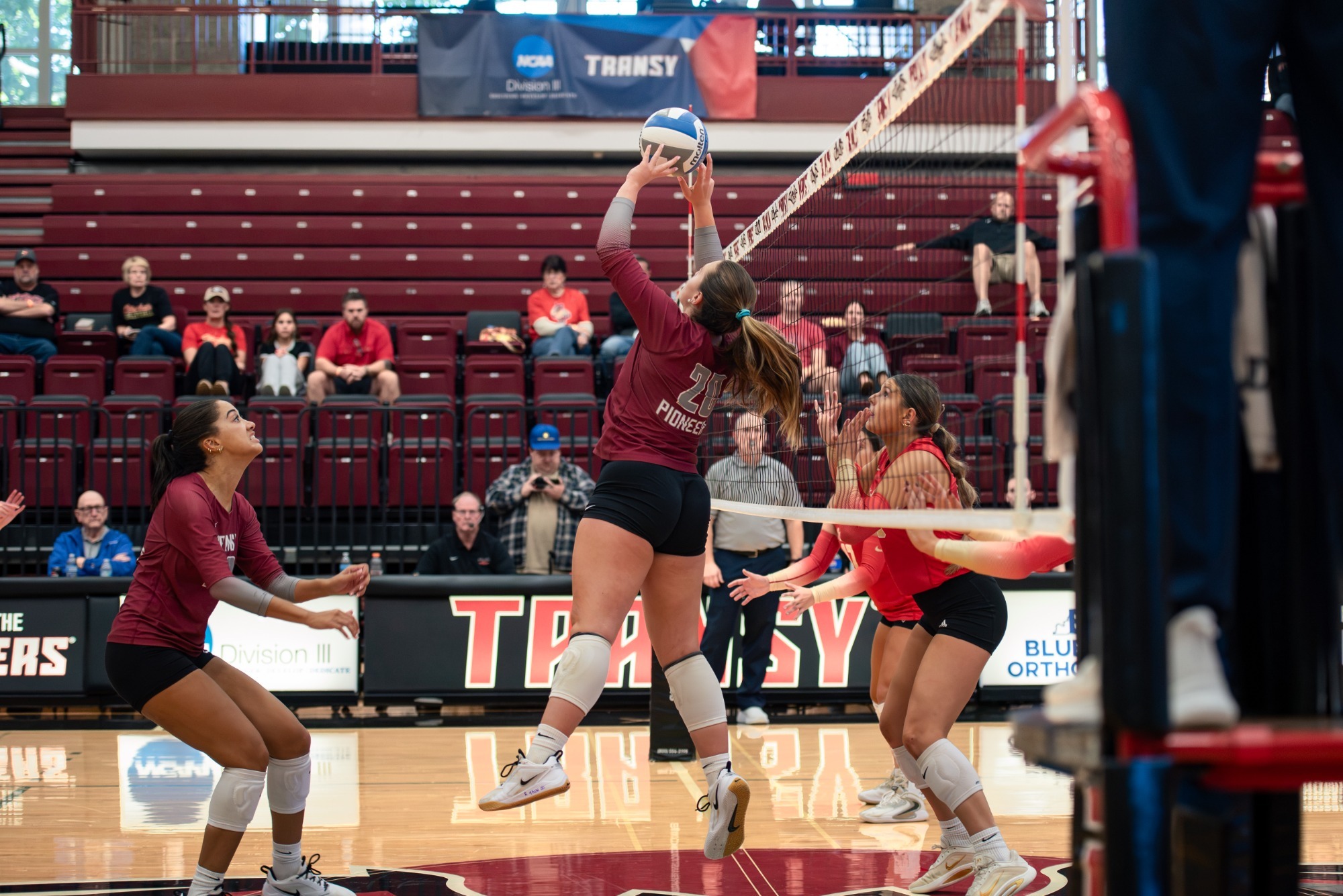 Erin Thomas (#20) in action against Otterbein. 