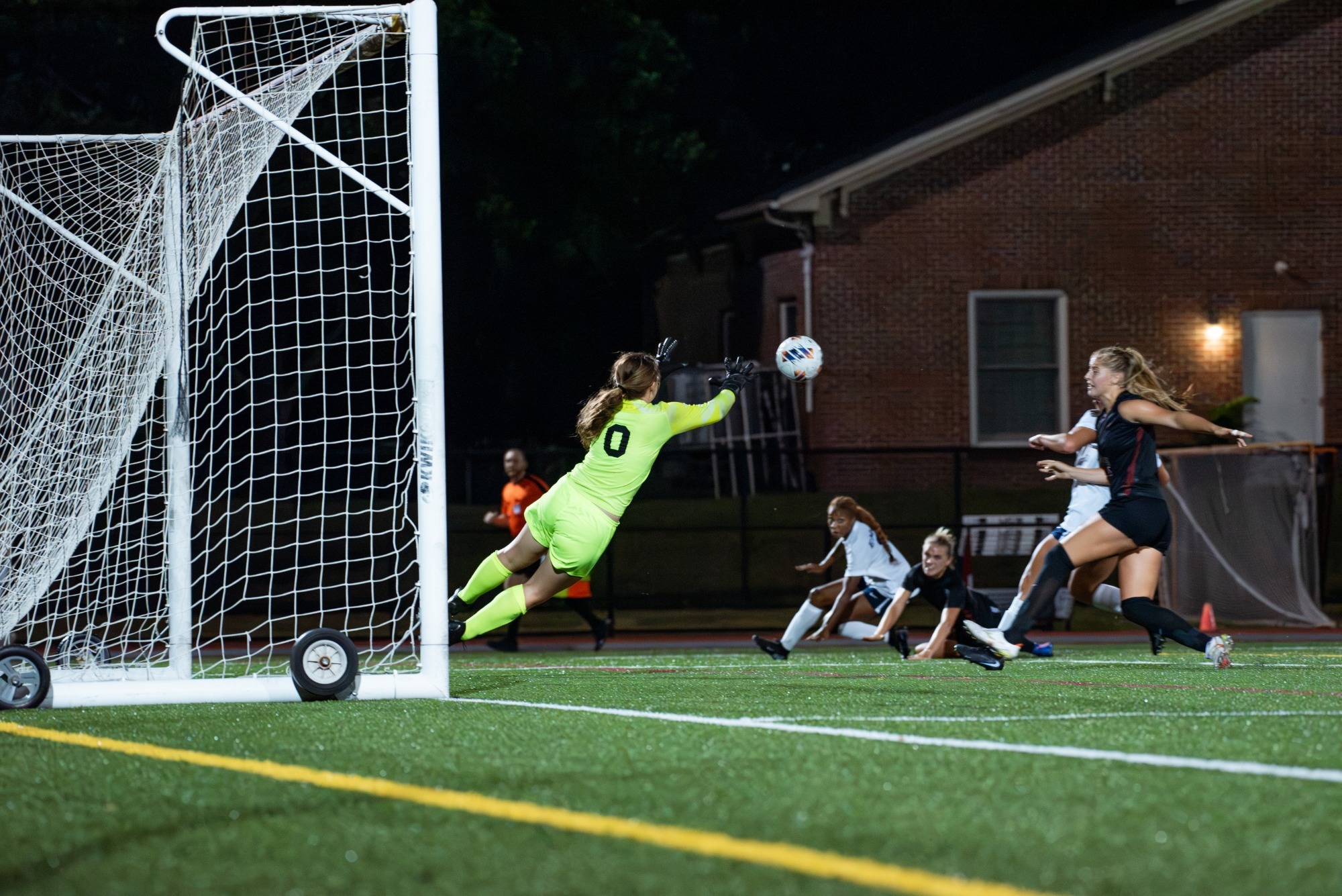 Carrie Stevens (#0) saves a shot attempt from Emory at Pat Deacon Stadium. 