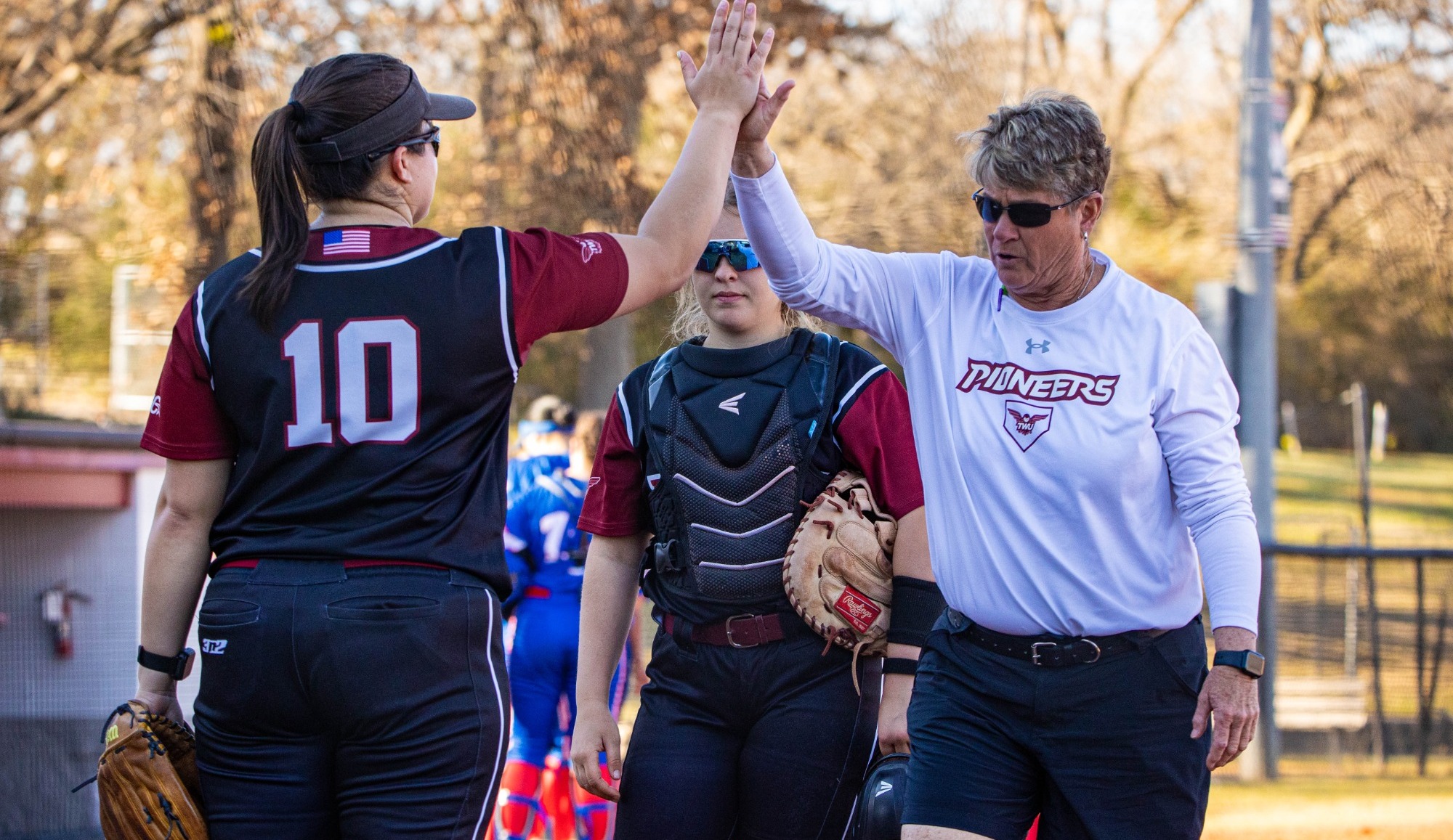 coach gay mcnutt high fives allison rodriguez 