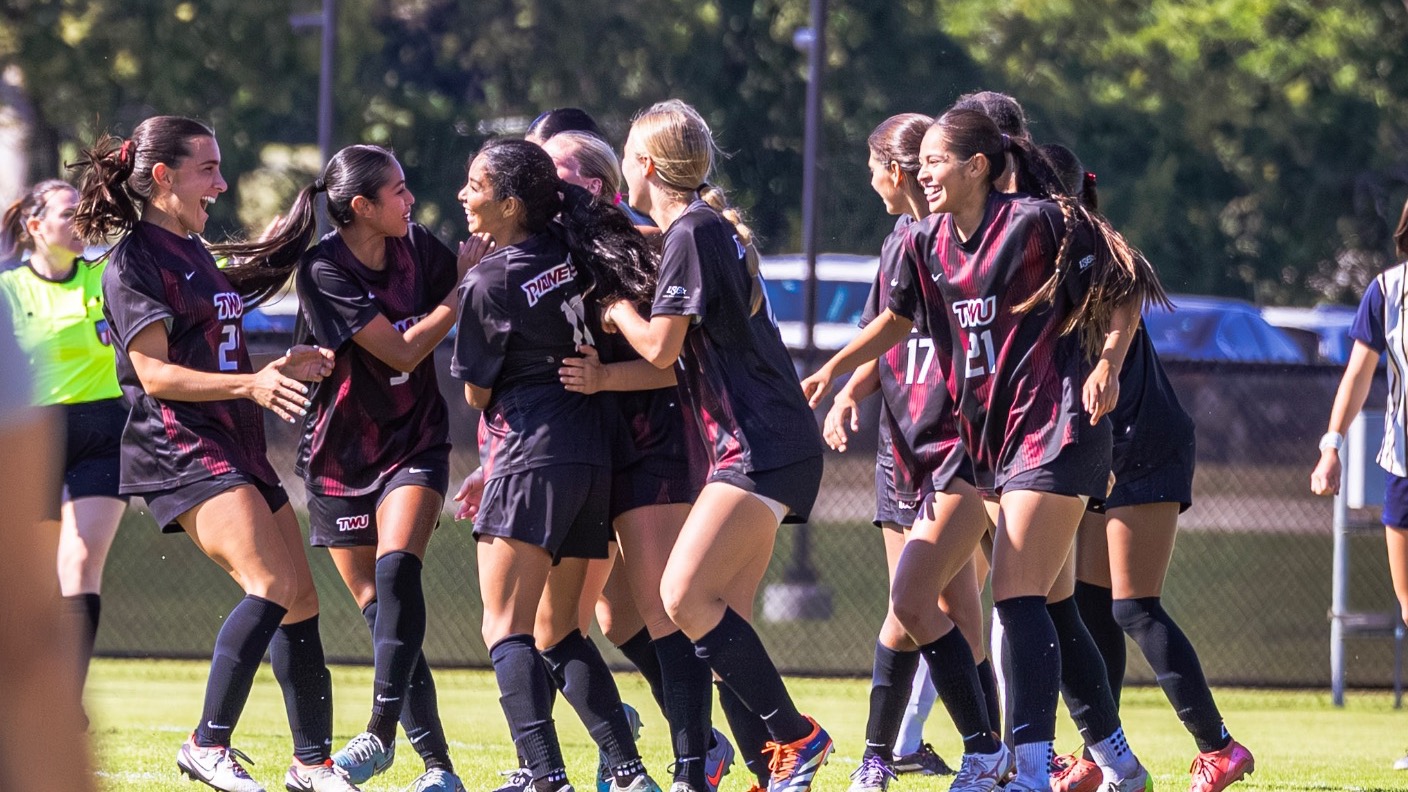 TWU celebrates vs SEU Soccer