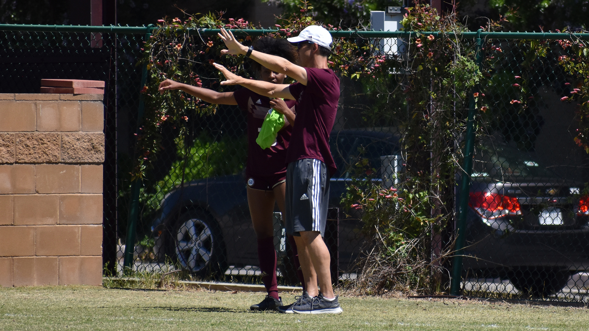 Steve Holeman with Zoe Junior in spring match vs. Texas A&M