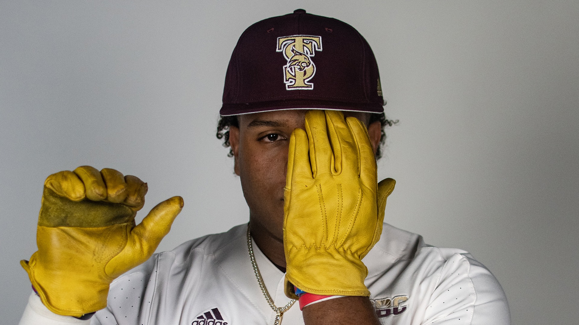 Rashawn Galloway with Yellow Working Gloves