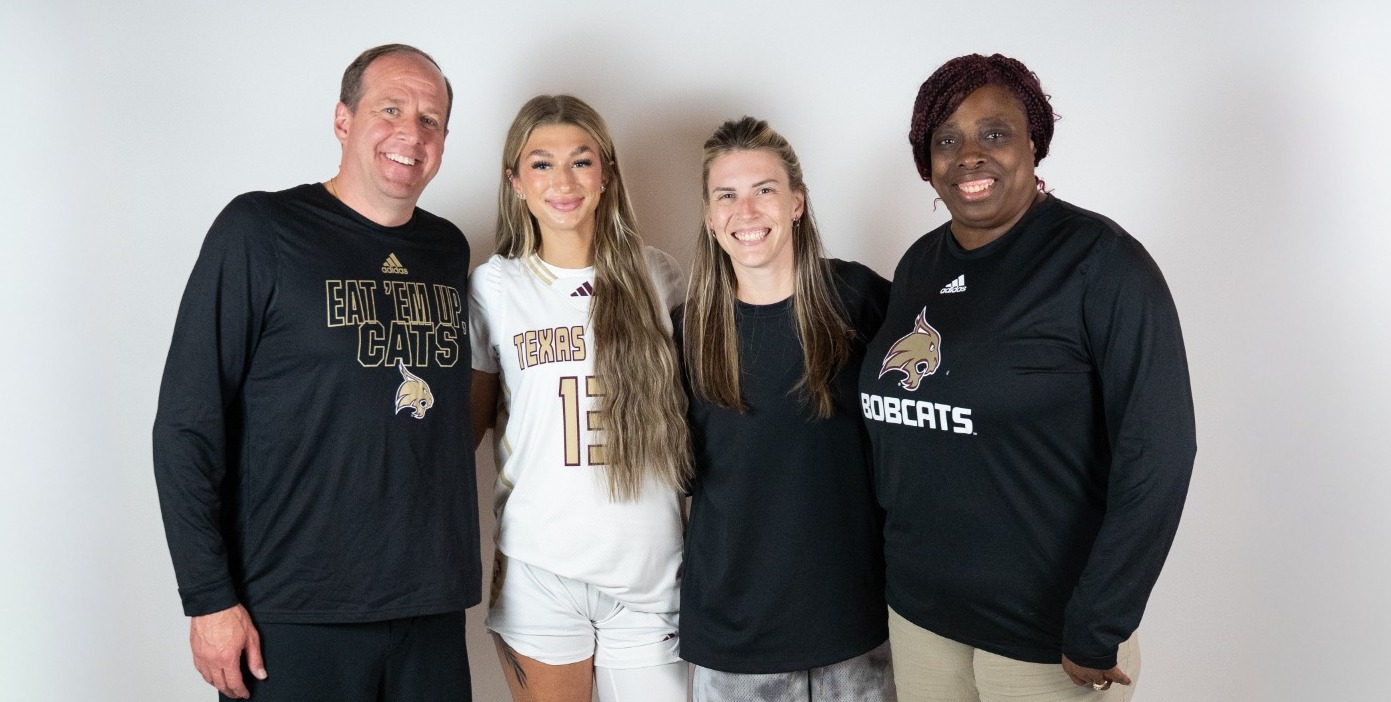Women's Basketball recruit Makenna Shaffer-Lauer poses with coaching staff