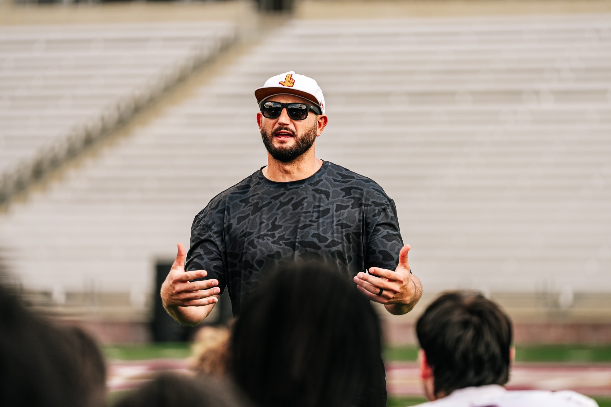 GJ Kinne Camp Huddle