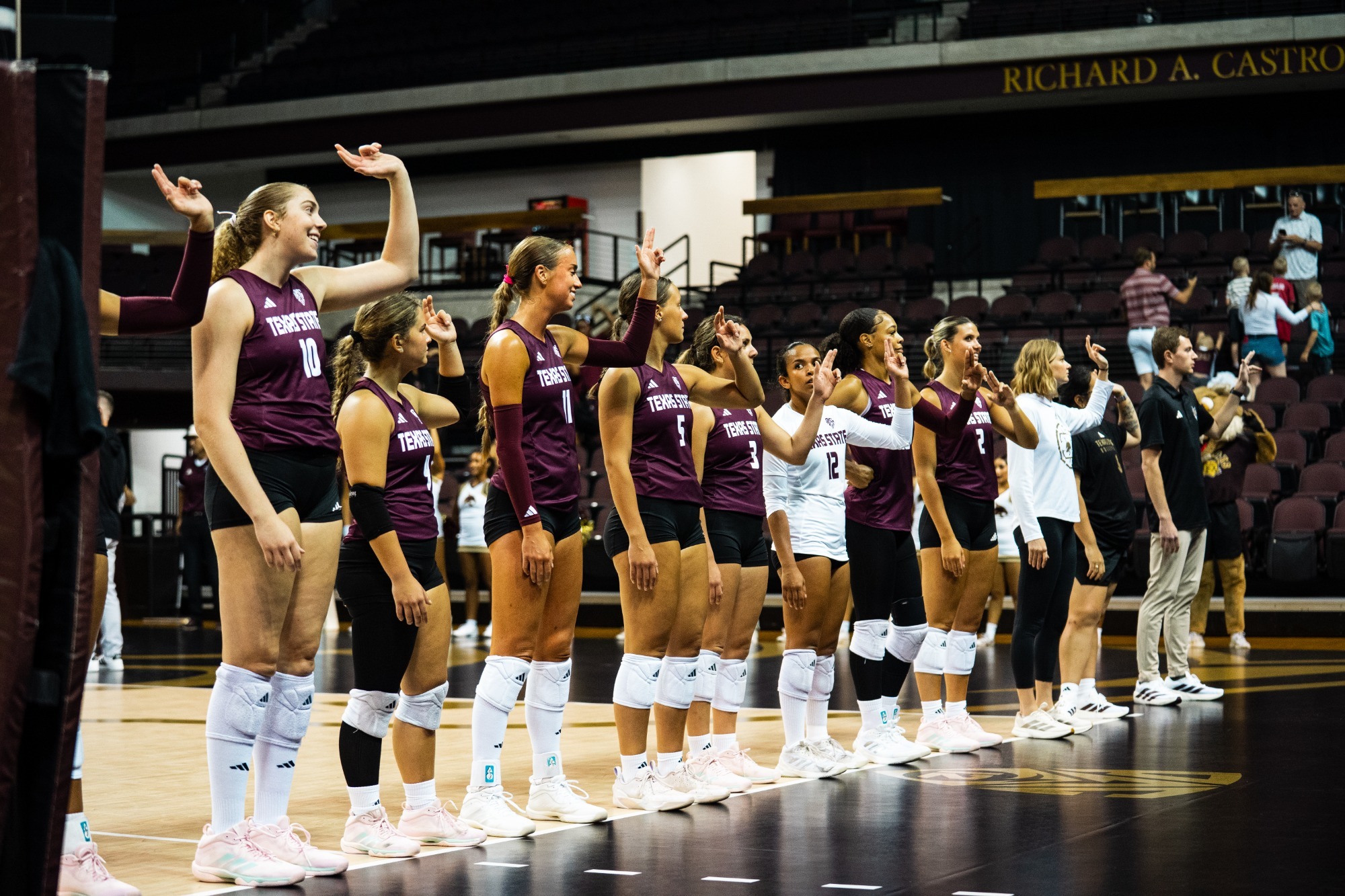 Team Singing Alma Mater With States Up Post-Match