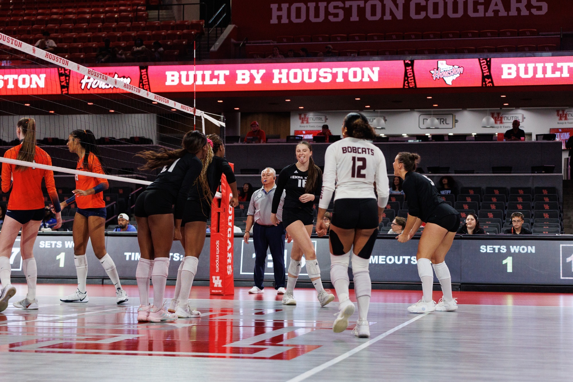 Caelyn Robel with Tongue Out Celebrating Point