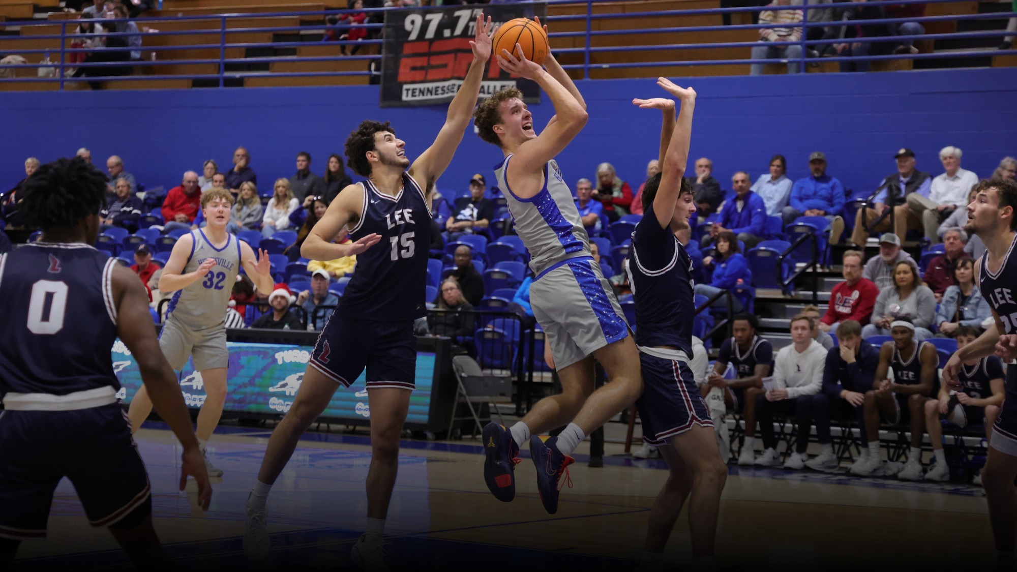 Thomas Allard shooting a layup in traffic