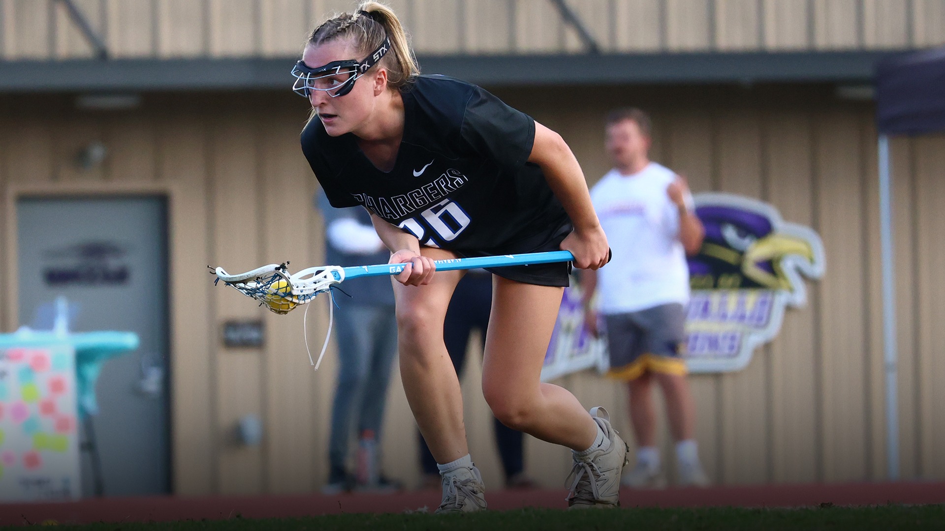 Sarah Cole taking a free position attempt wearing a black uniform