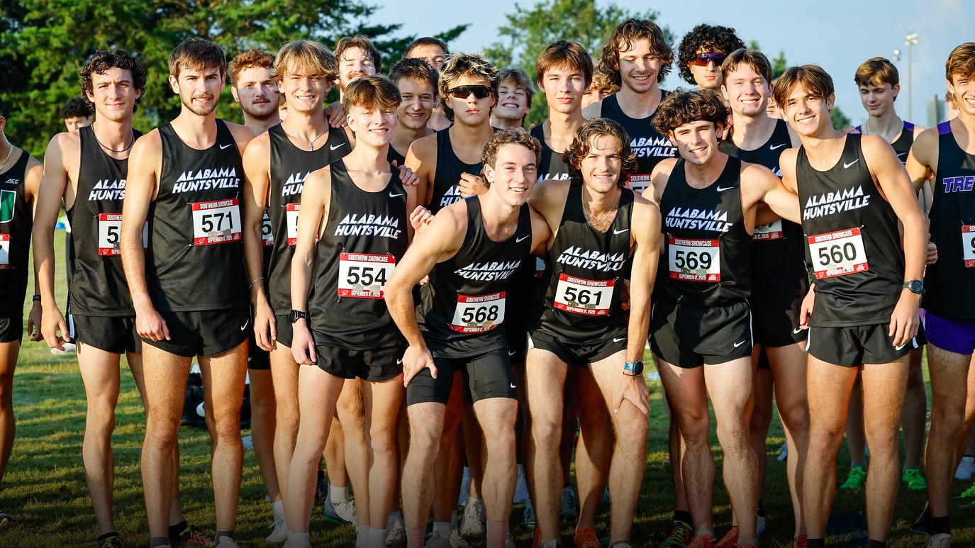 Cross Country team posing pre-race
