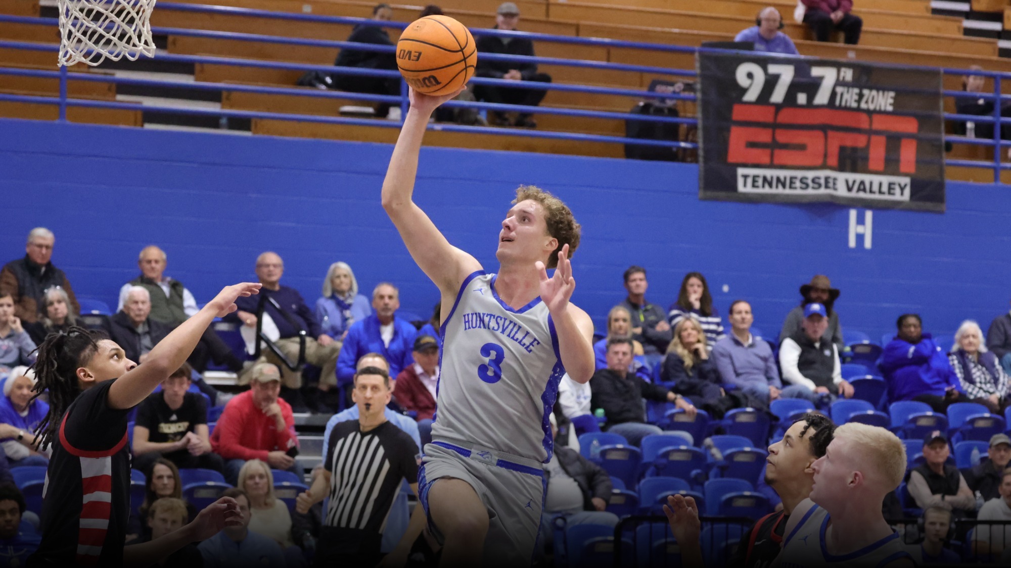 Thomas Allard shooting a layup