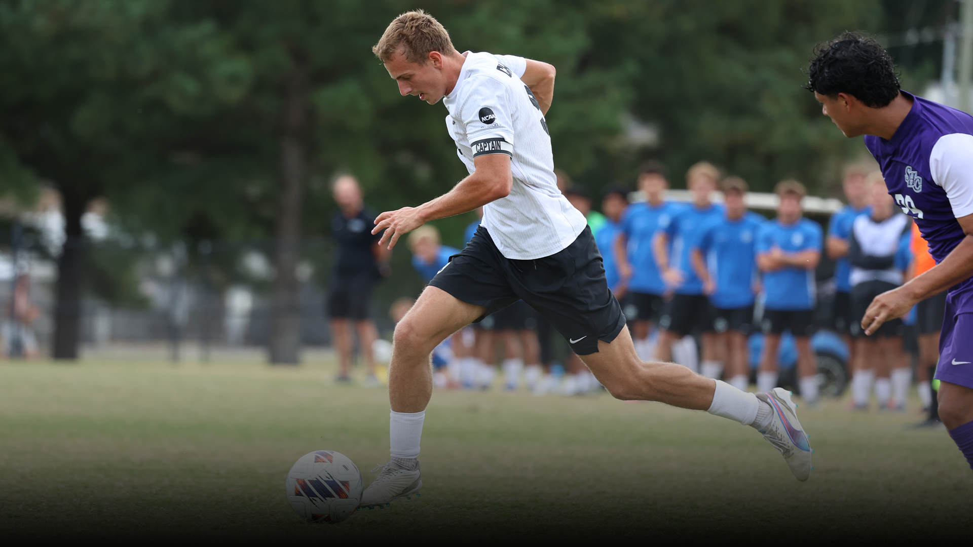 Oli Orzechowski dribbling the ball