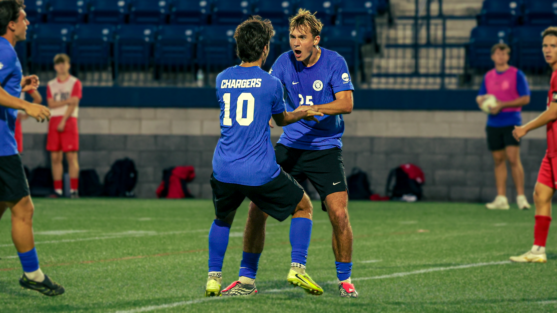 Harry Schramm and Brennan Leblanc celebrate a goal