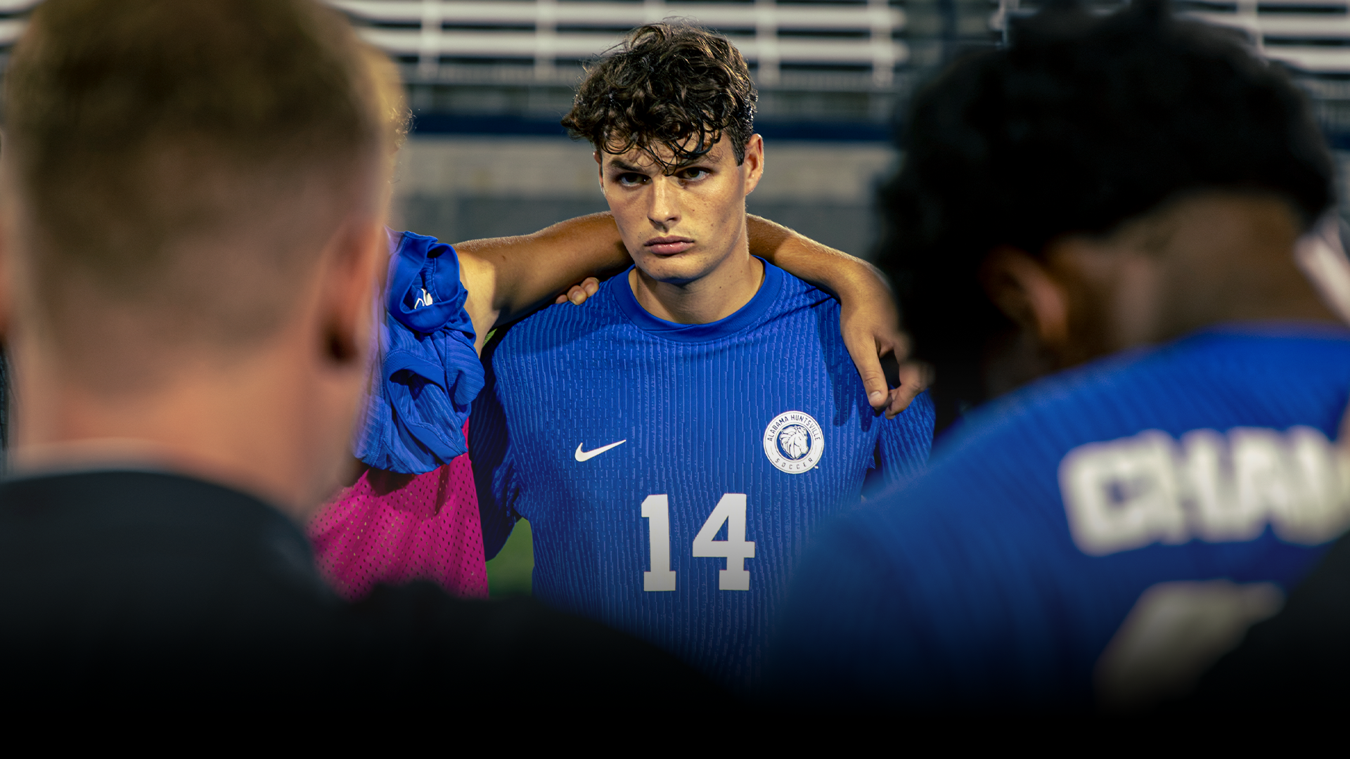 Xavier Martin in the post-game huddle