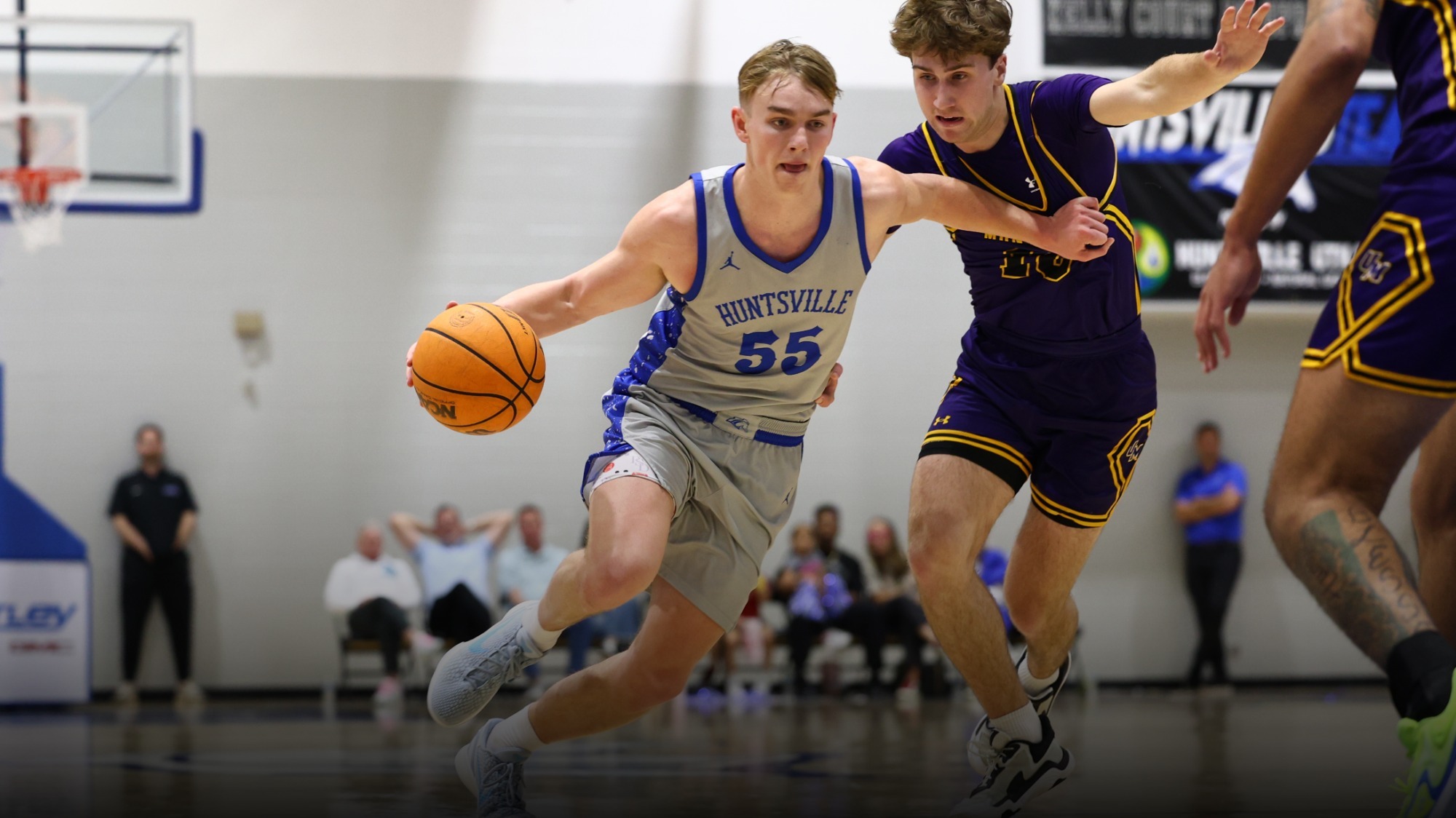 Knute Wood driving past a defender