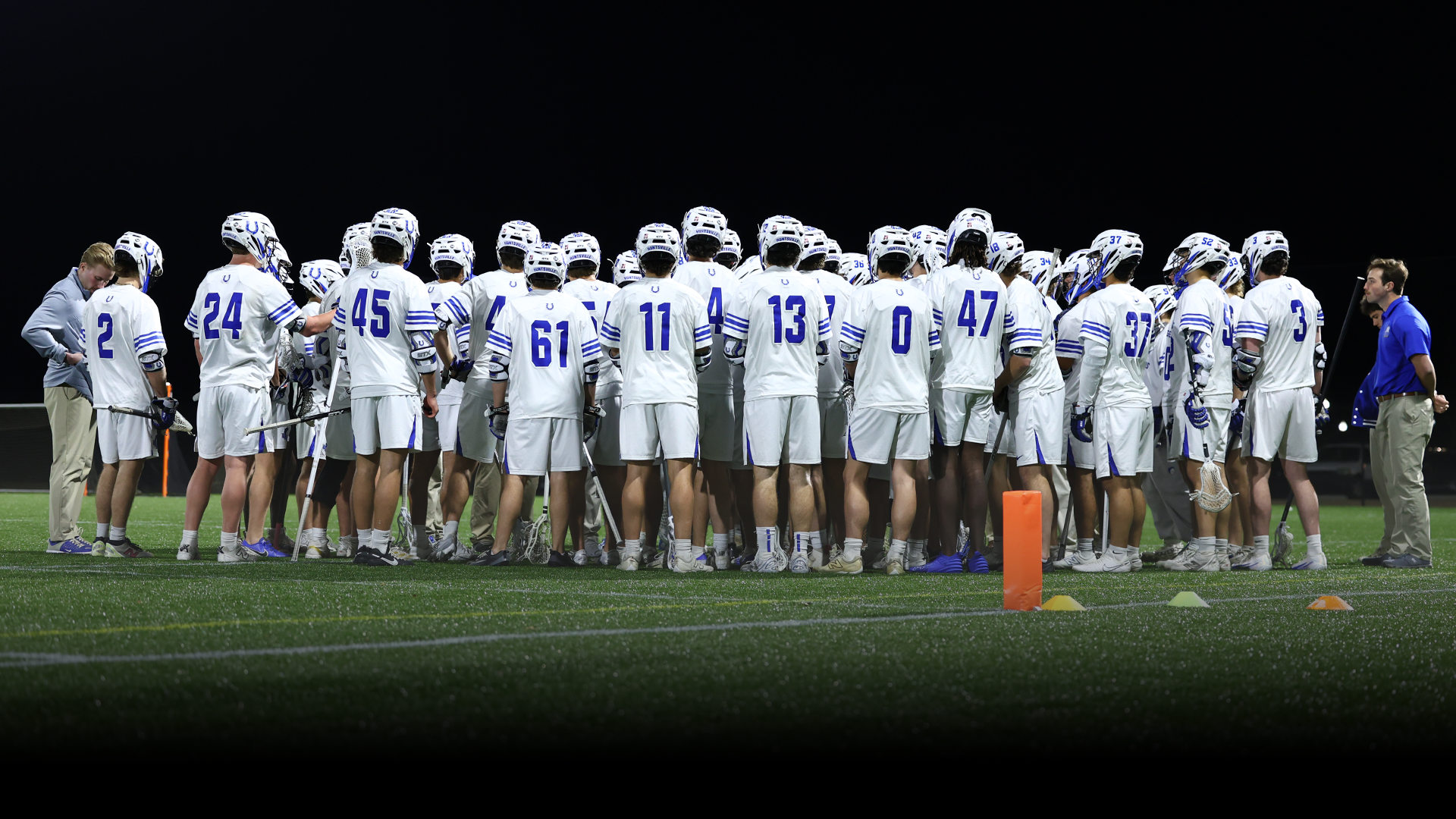 Men's Lacrosse Team Huddled Up