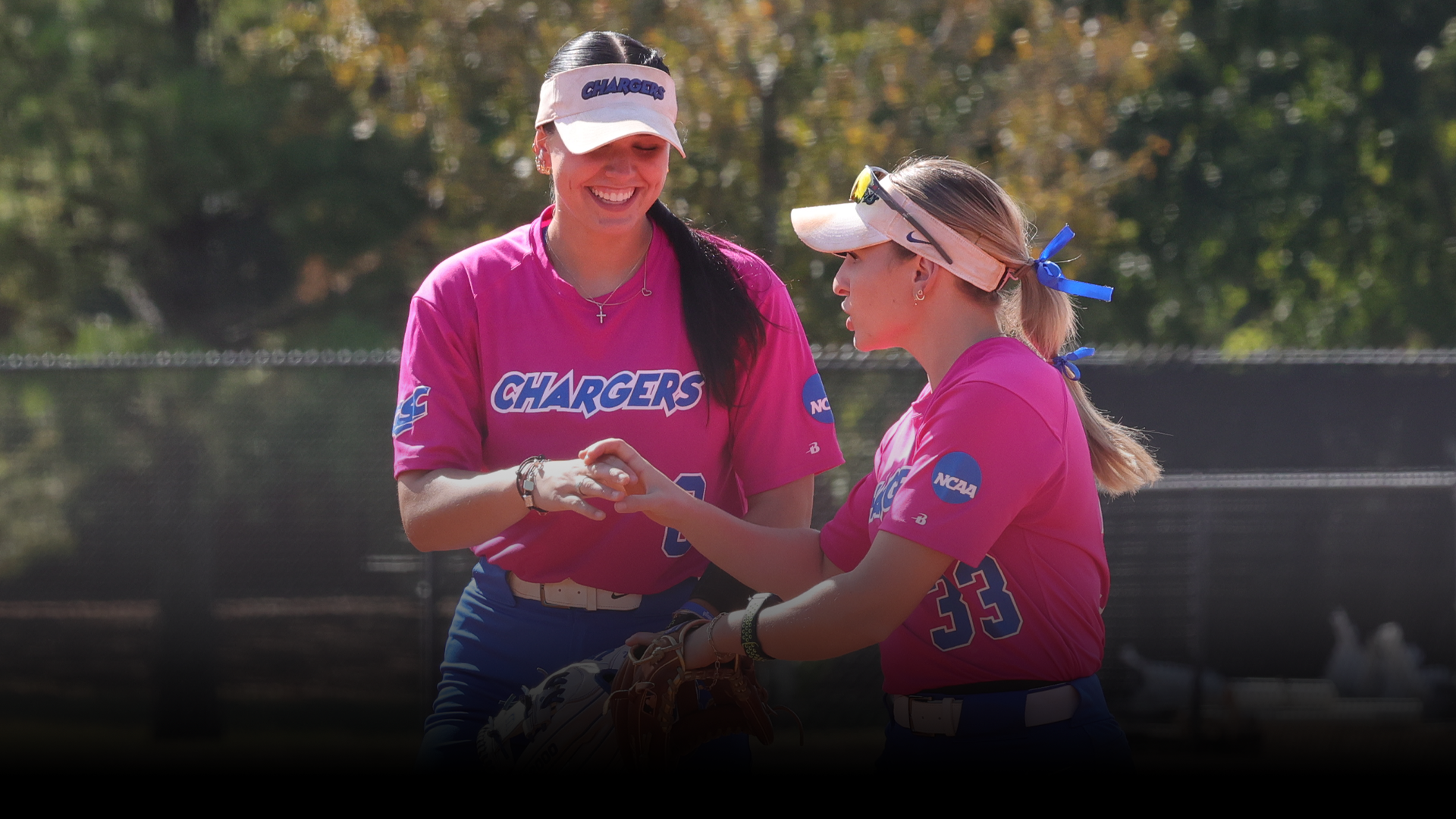 Kylee Smith and Alexa Douthitt high-fiving