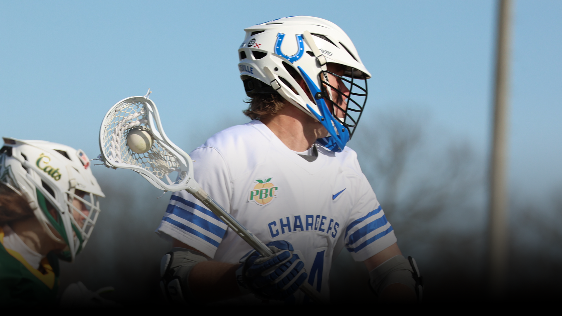 Aydan Weiszhar running downfield with the ball