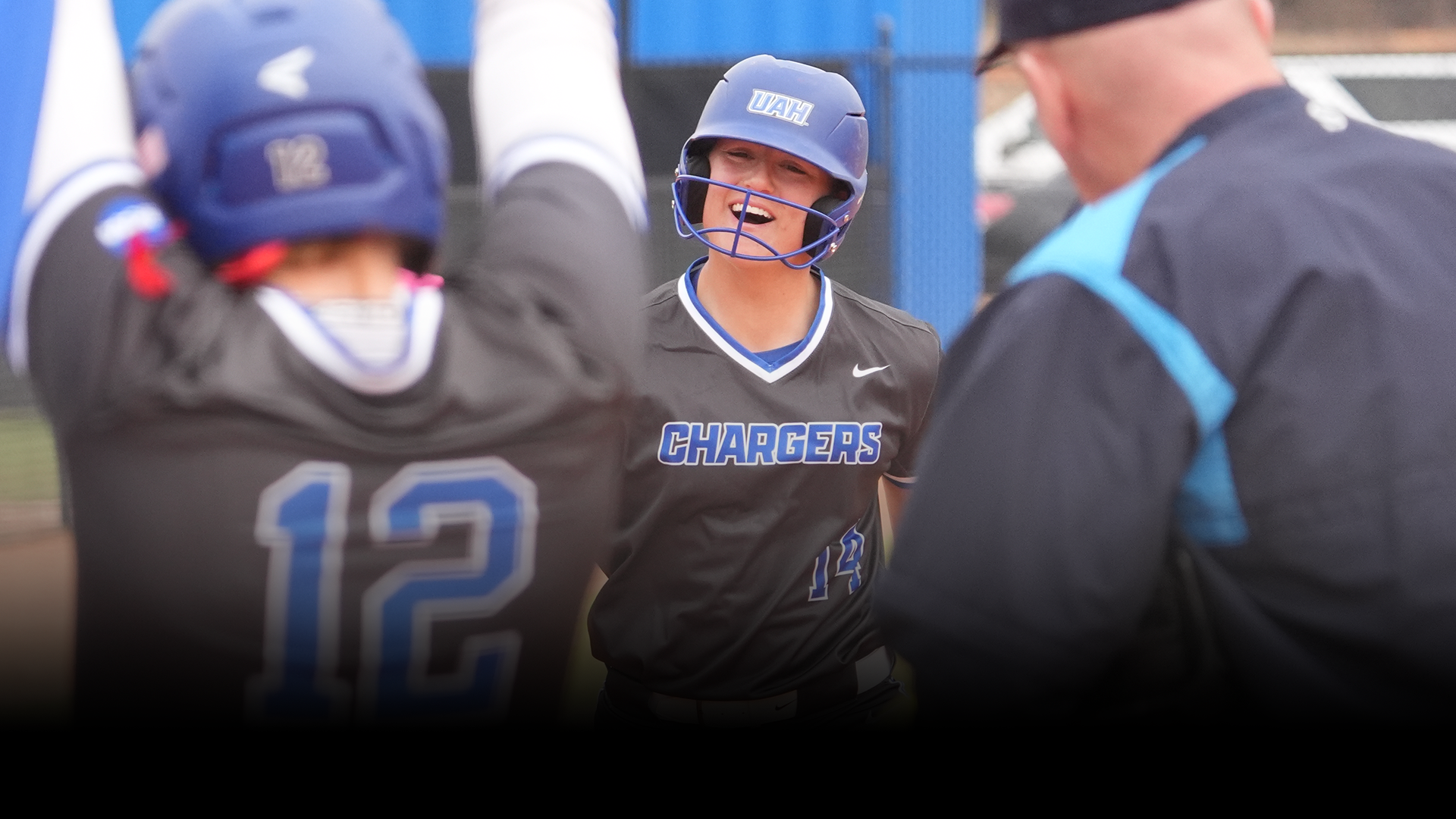 Abby Flynt smiling after hitting a home run