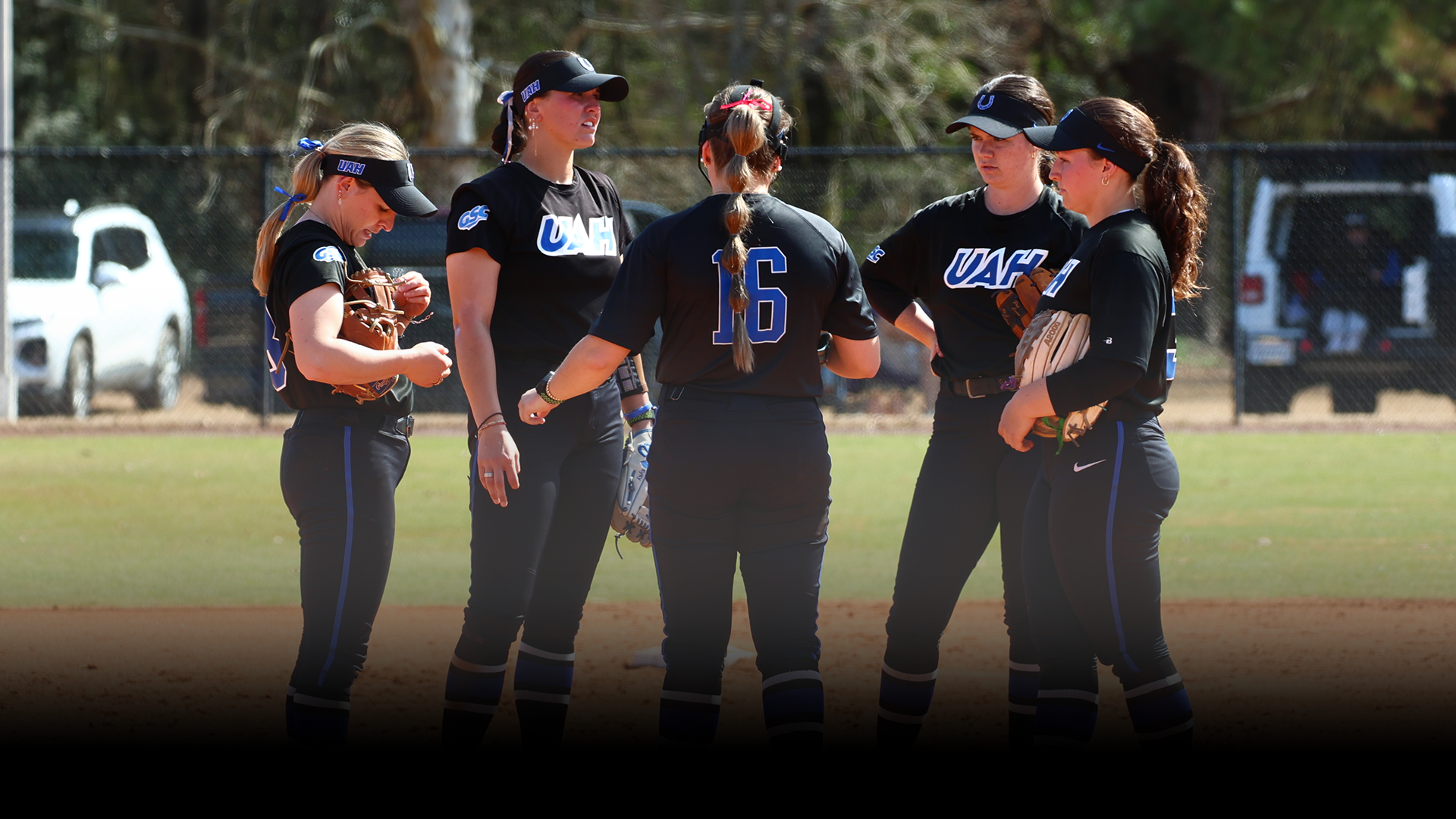 Softball team mound visit
