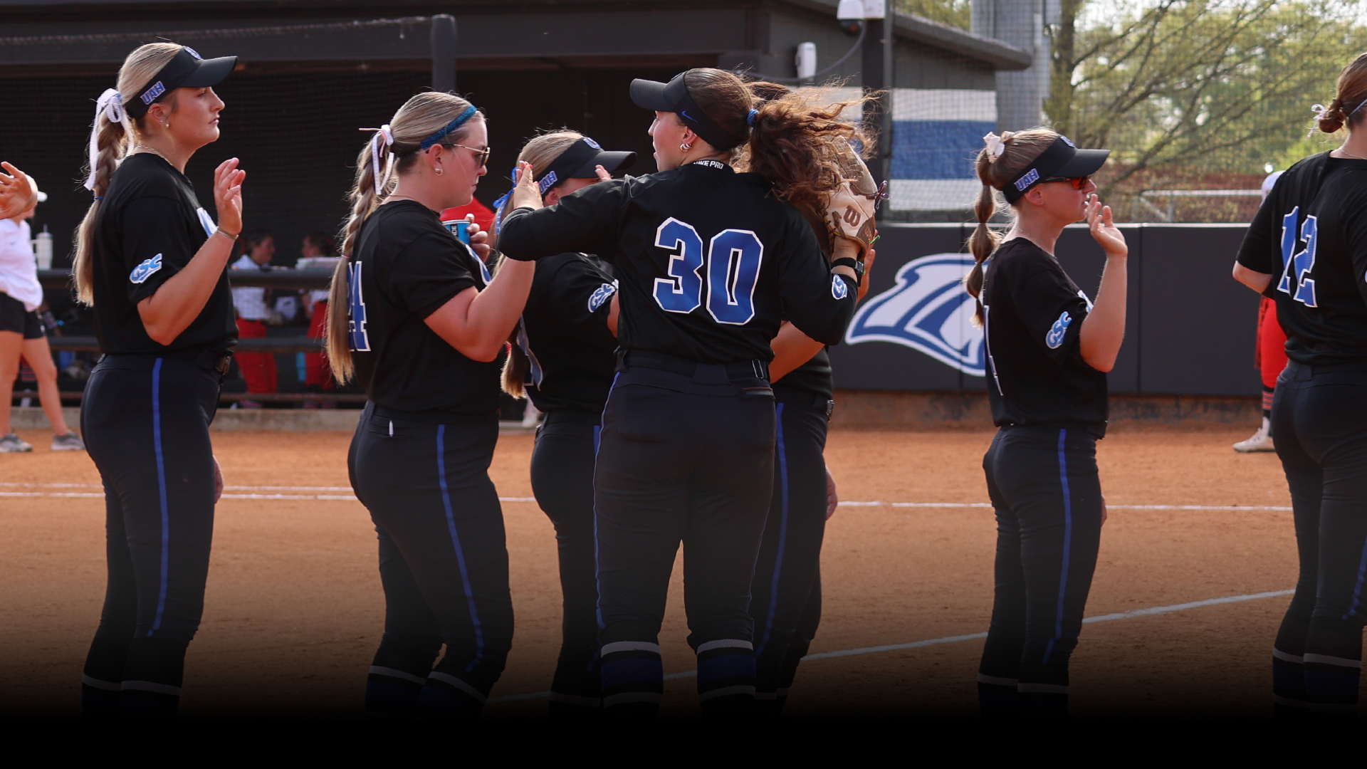 Kylie Ballentine high-fiving teammates