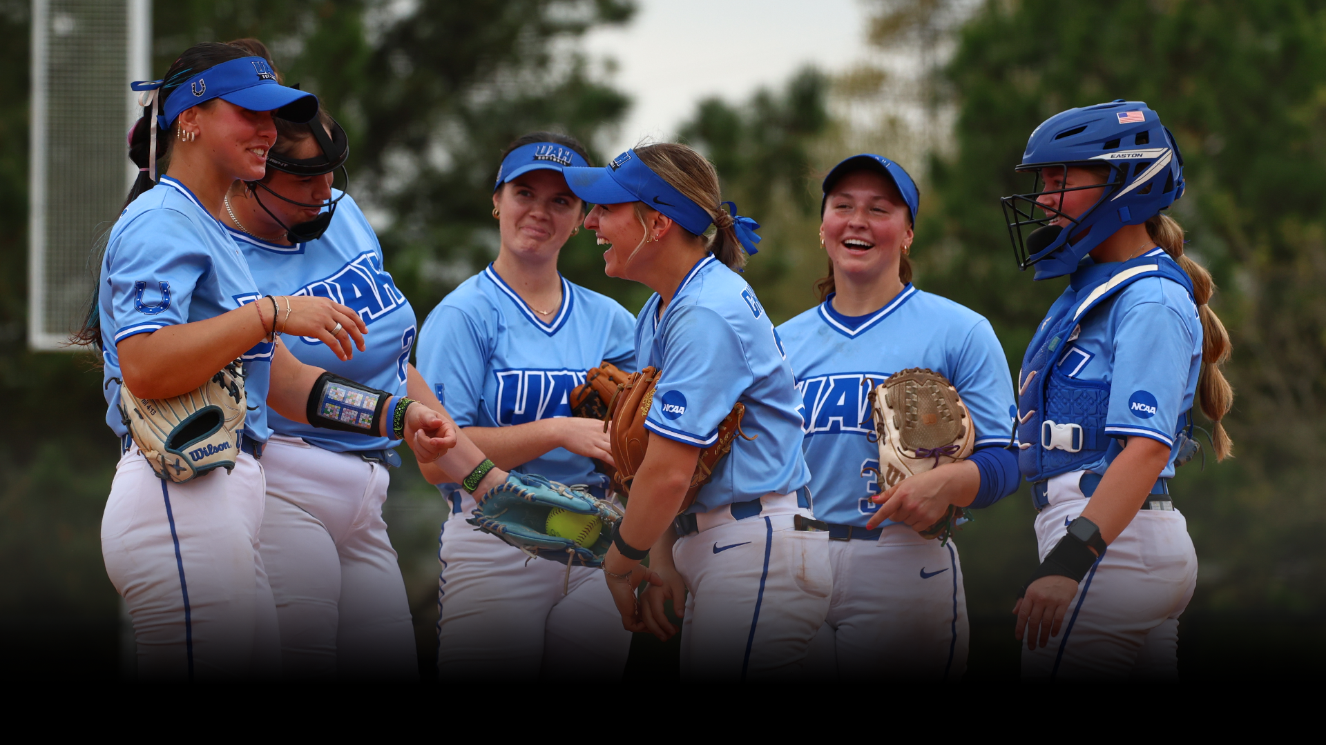 SB team smiling during mound visit