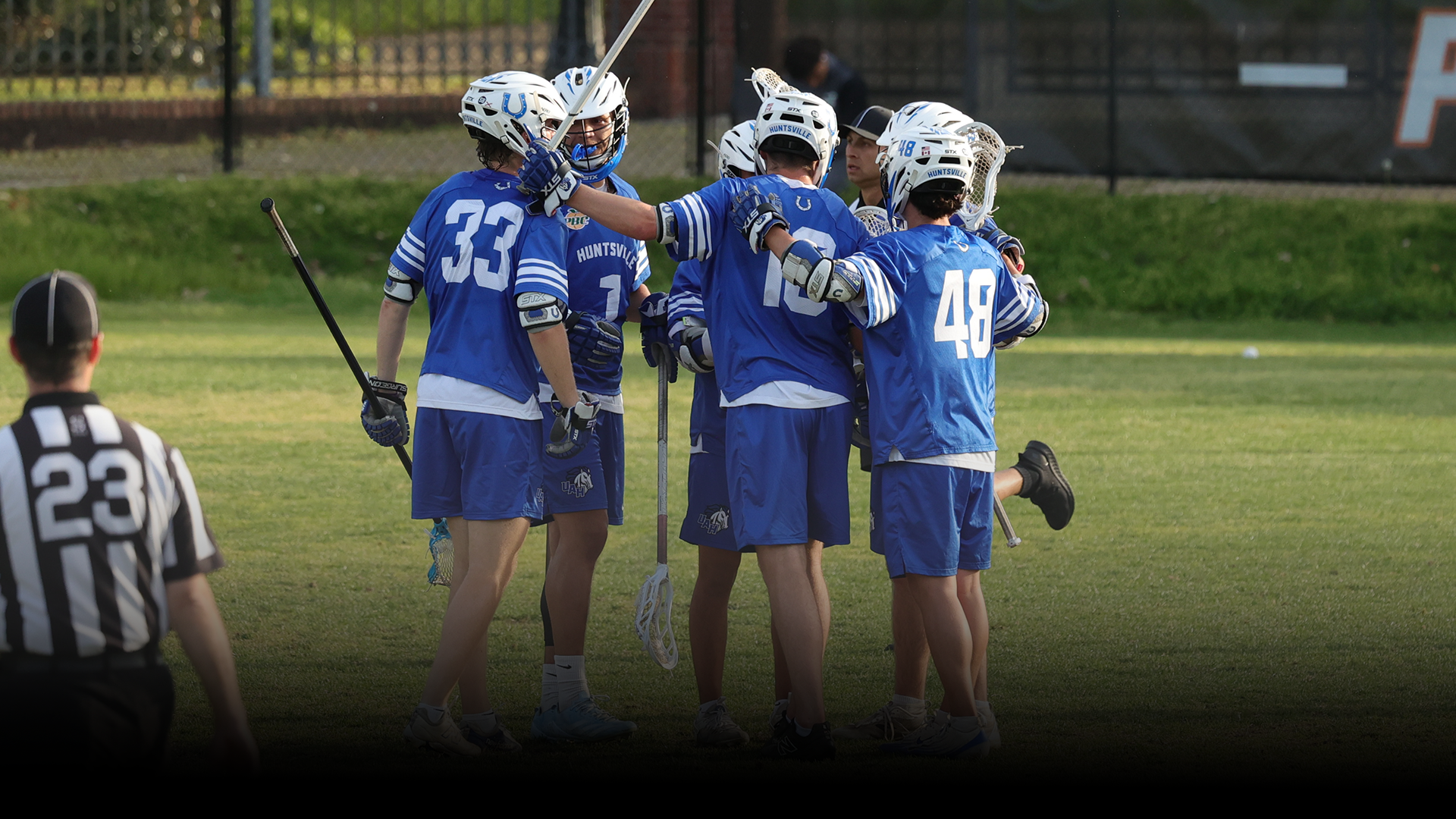MLAX team celebrating a goal