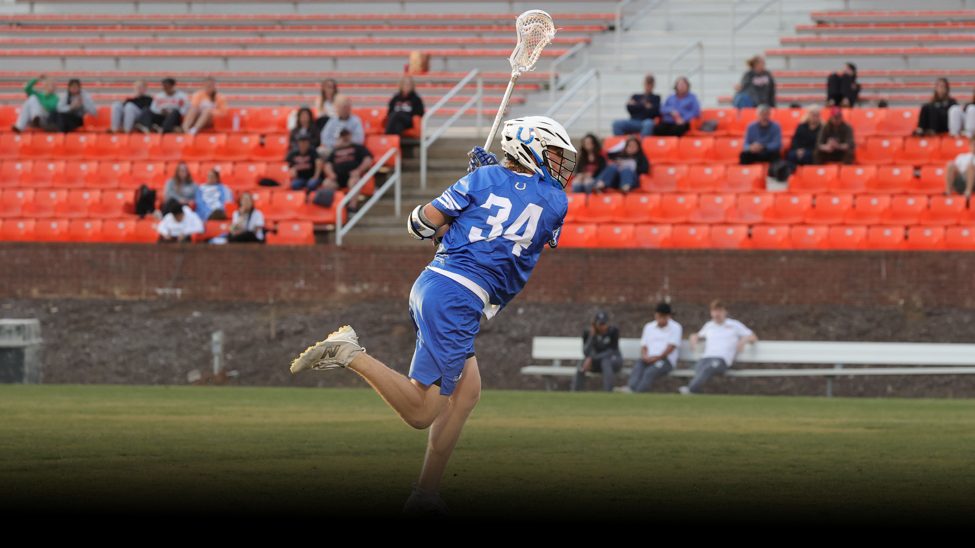 Aydan Weiszhar firing a shot