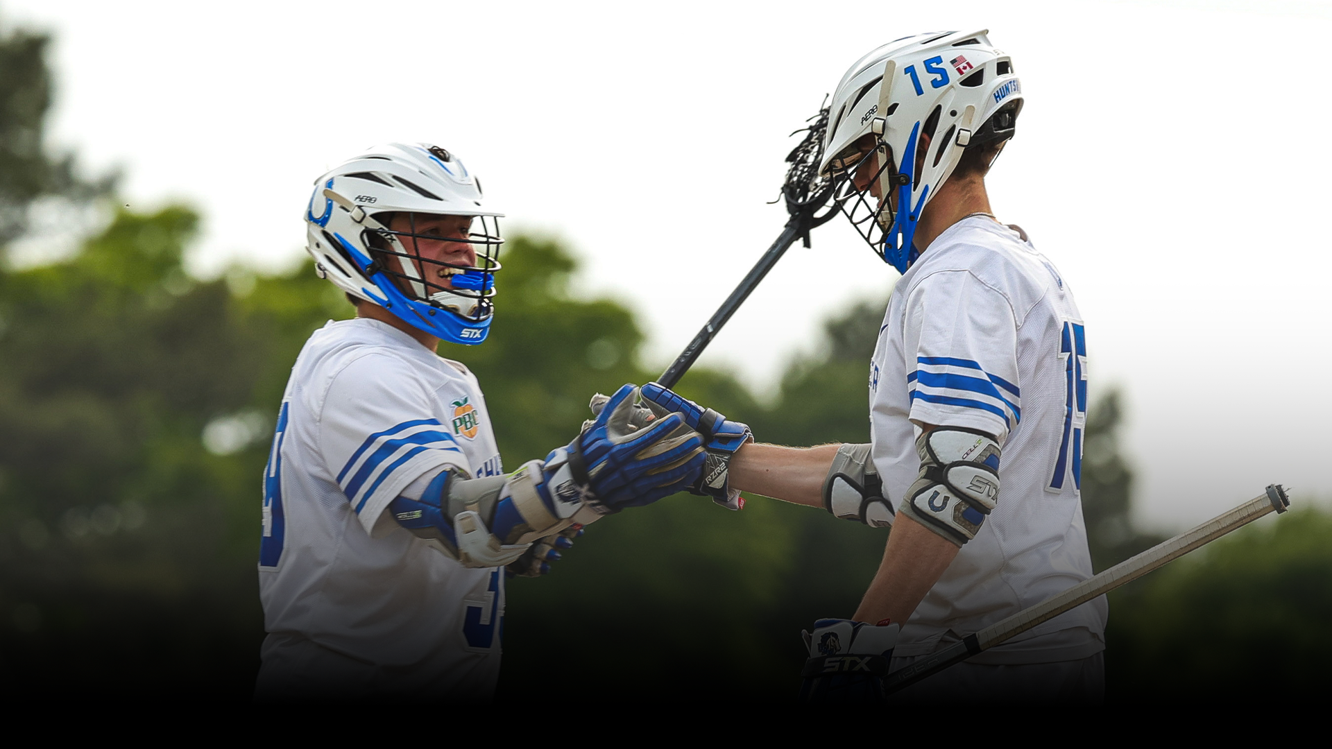 Chris Aiello and Zach Hublert celebrate a goal