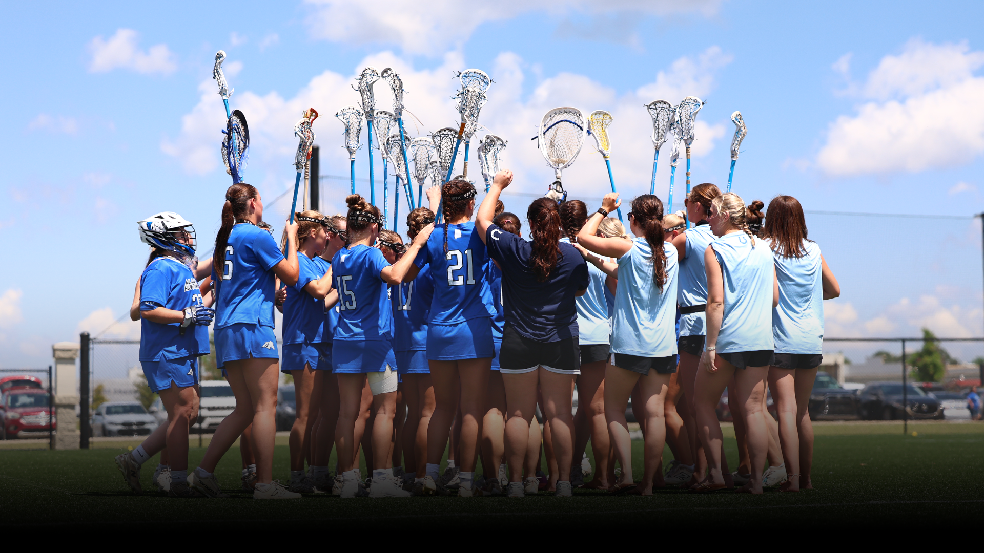 Women's Lacrosse Team Huddled Up