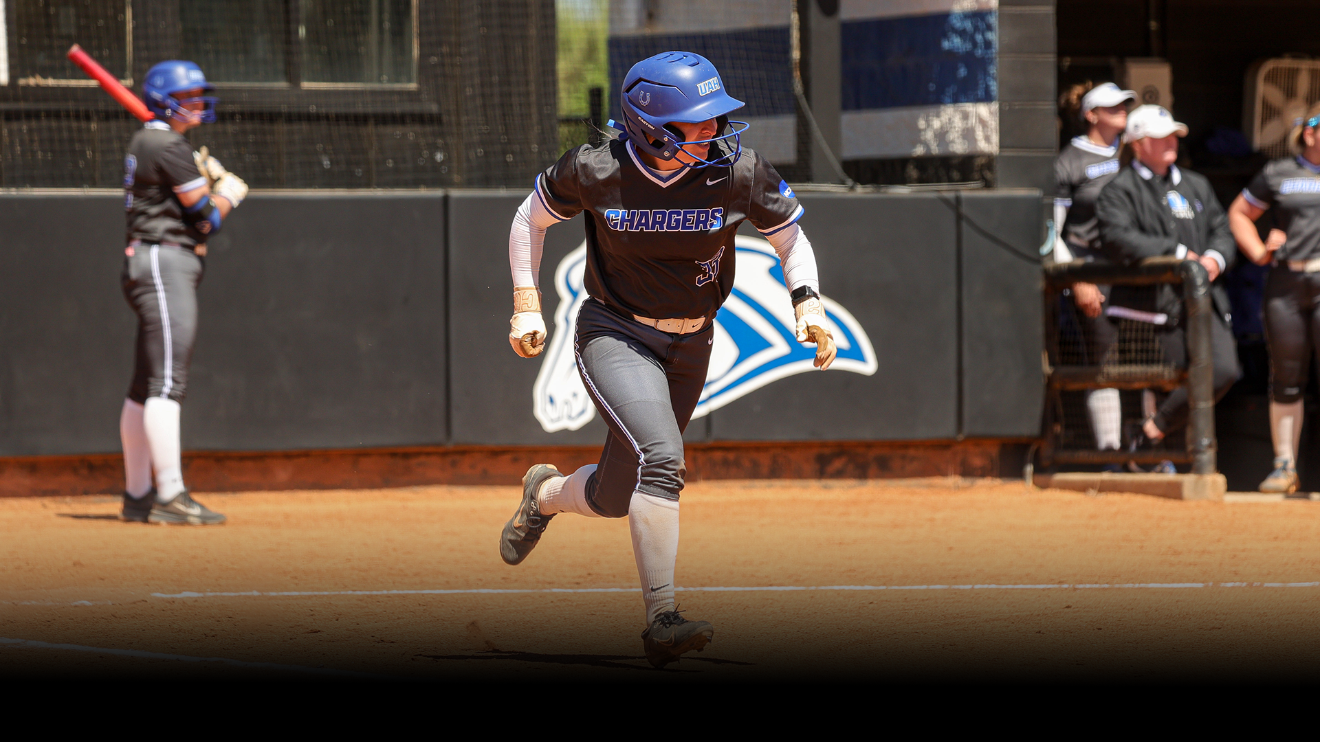 Alexa Douthitt running to first base