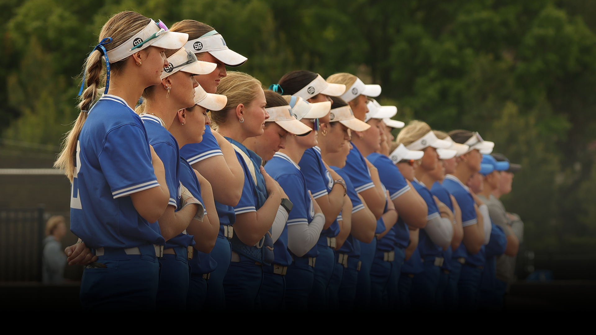Softball Team Standing for the National Anthem
