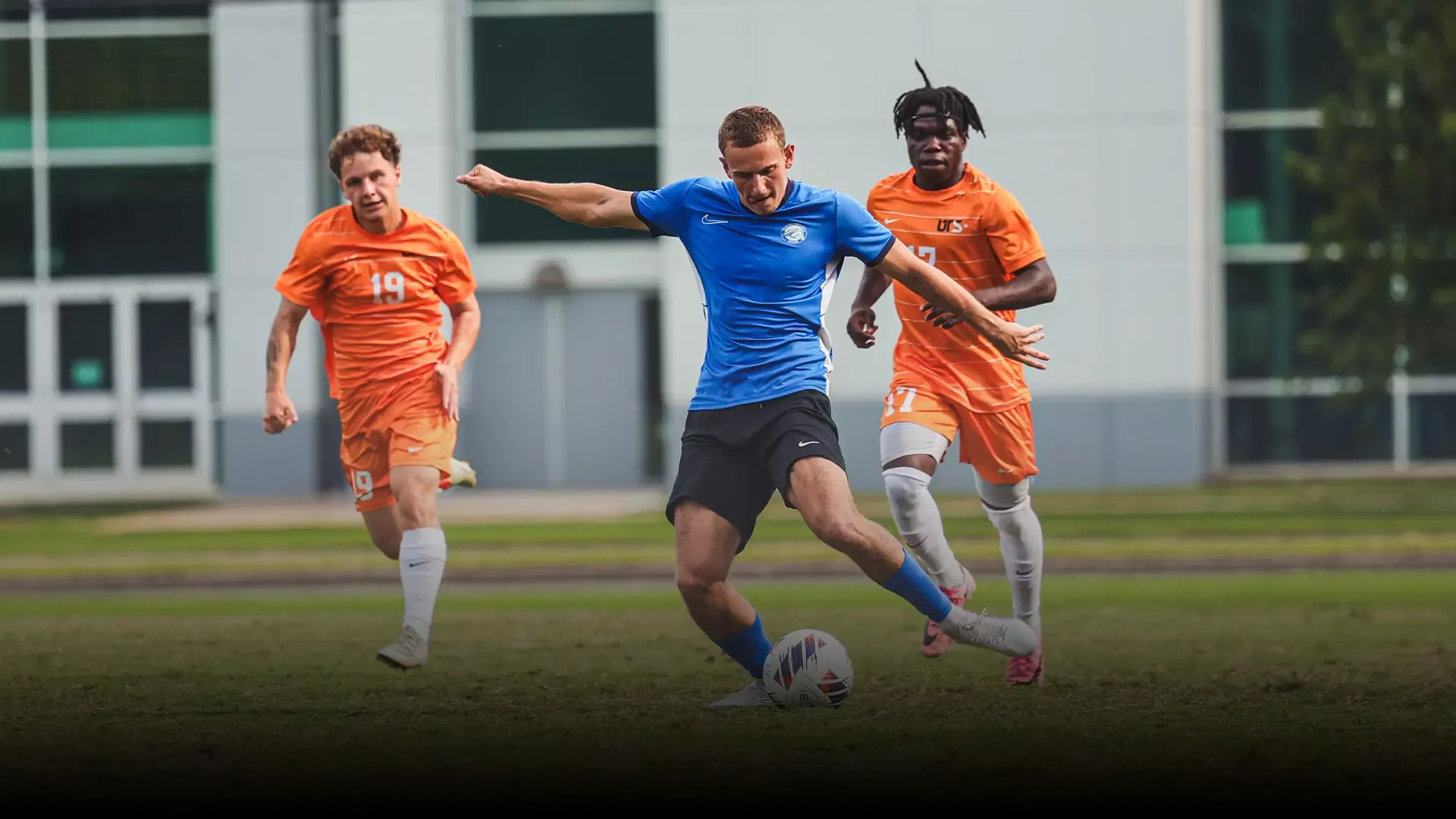 Oli Orzechowski passing the ball
