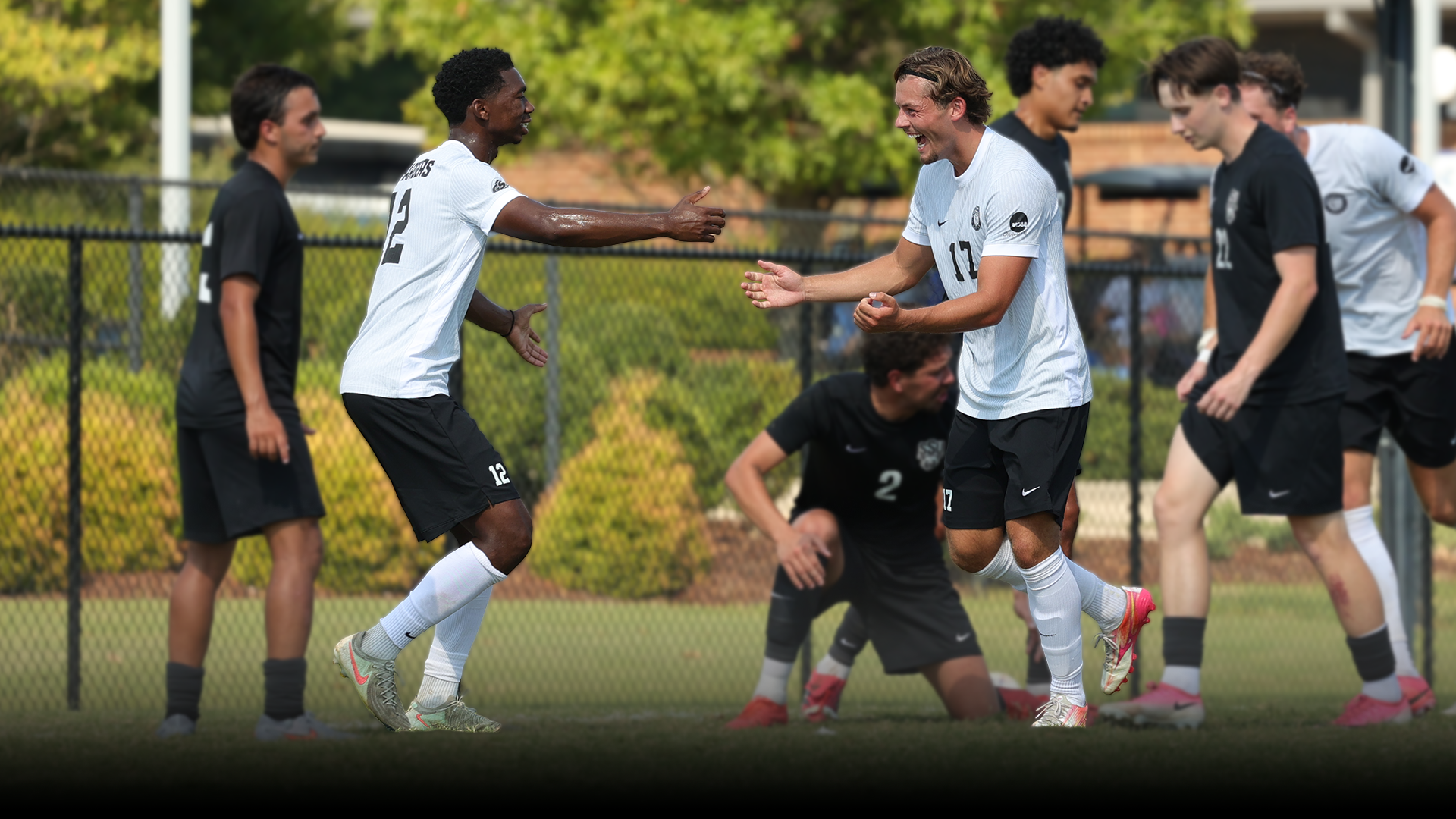 Ollie Rigby and Donovan Pruitte celebrate a goal