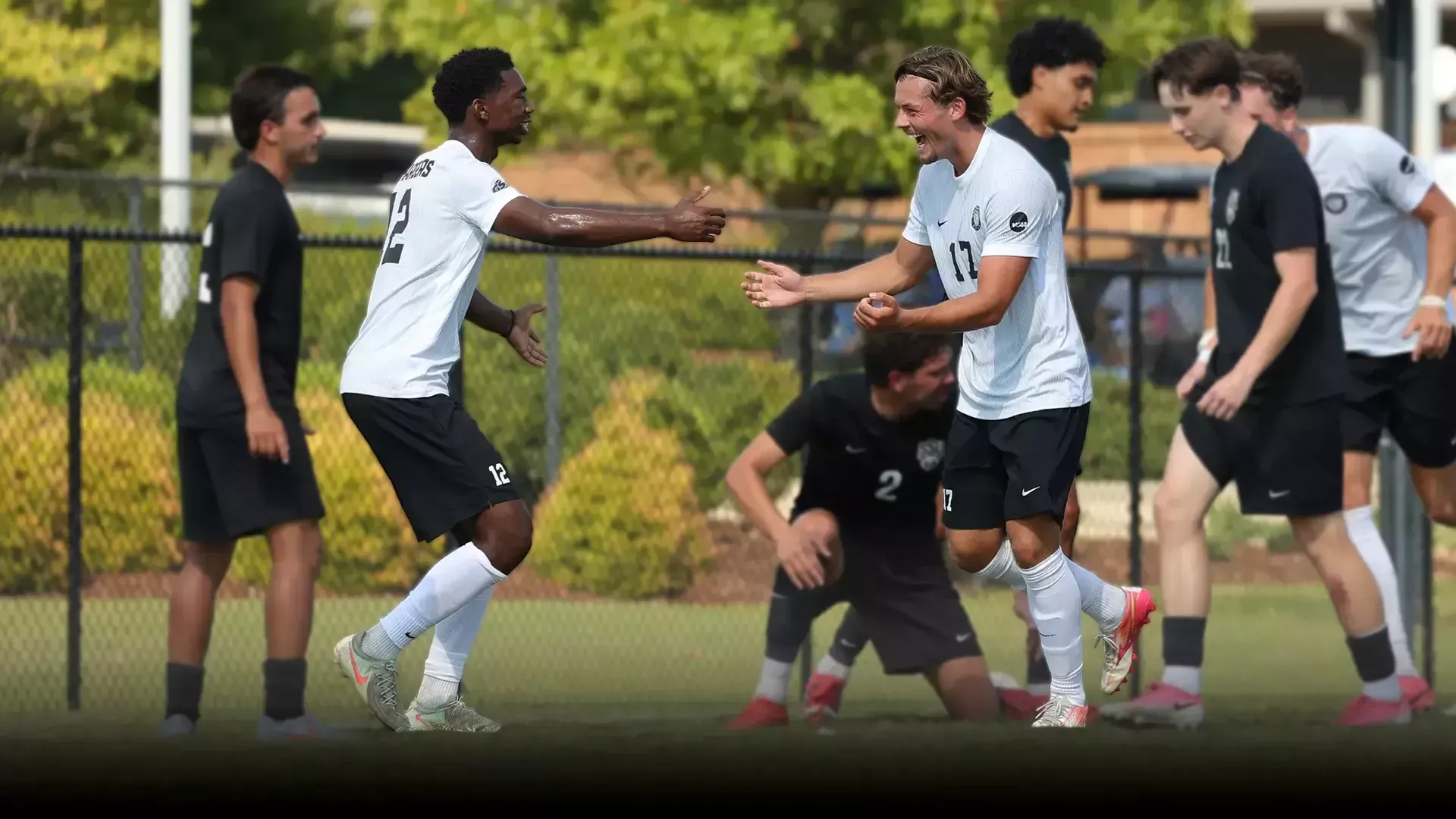 Ollie Rigby and Donovan Pruitte celebrate a goal