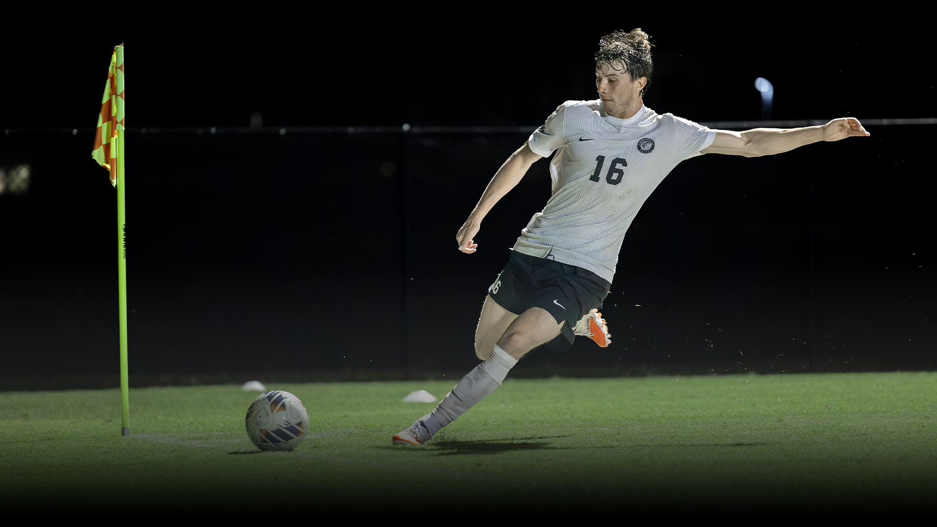 Andrew O'Neil winding up to cross the ball