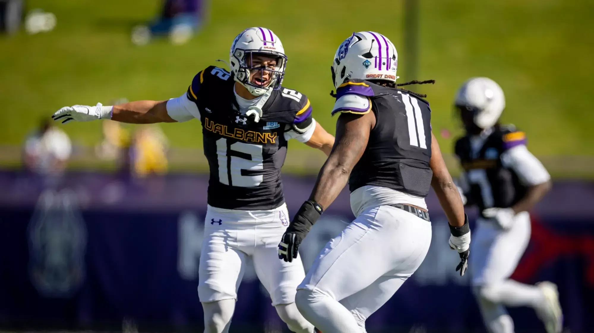 Shawan Lewis and Victor Holt Celebrate in Great Danes win over Campbell