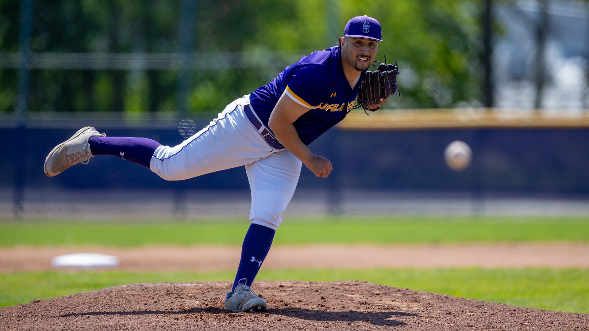 Dylan Banner throws against Binghamton in May, 2026